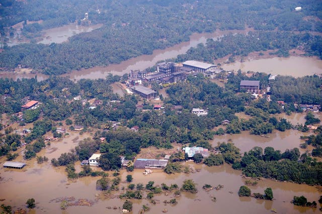 <p>People affected by floods collect their belongings from train tracks after drying them following Cyclone Ditwah in Kandy, Sri Lanka, on 2 December 2025</p>
