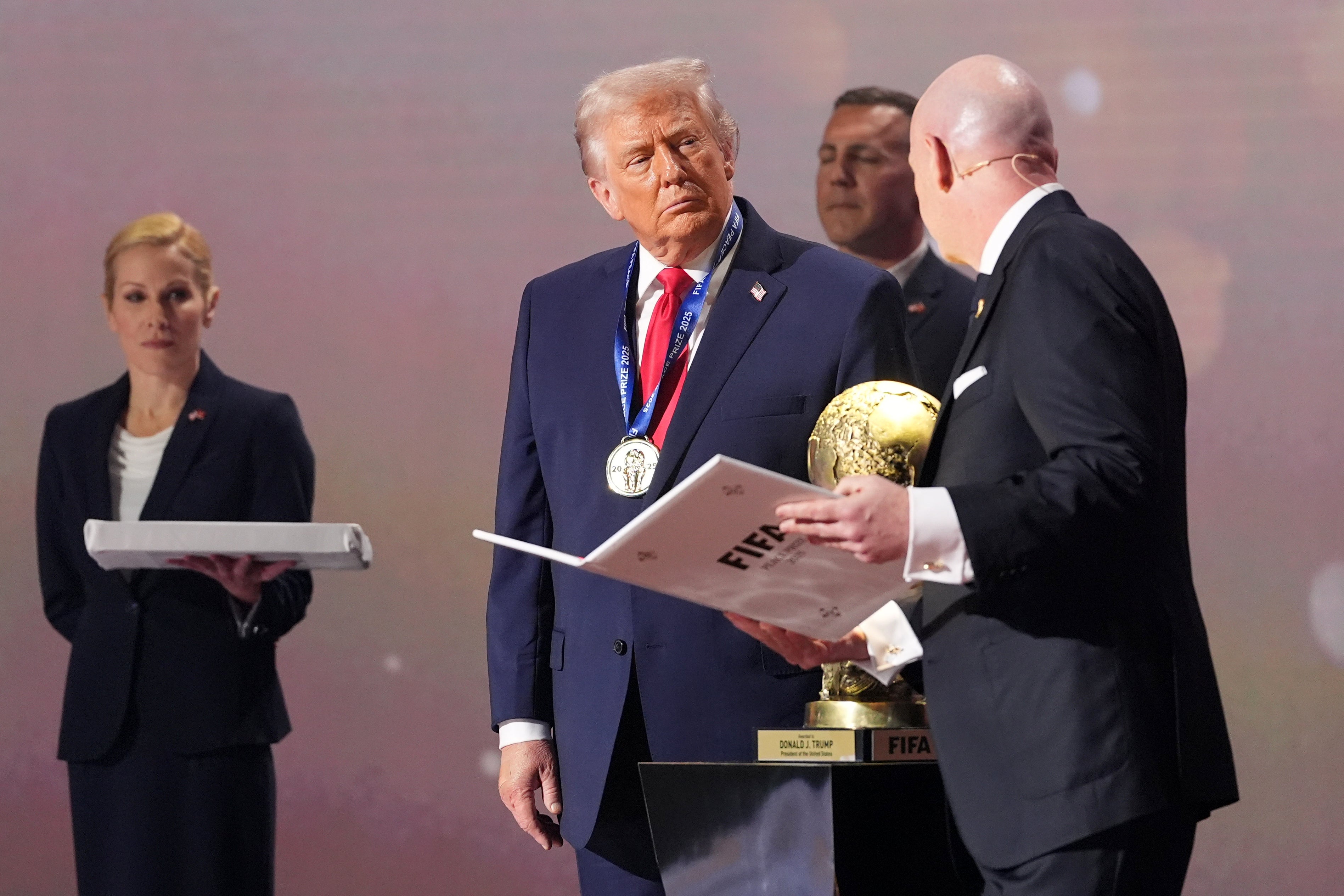 Soccer fans reacted with outrage and incredulity as Donald Trump accepted the newly created ‘FIFA Peace Prize’ during the 2026 World Cup draw.