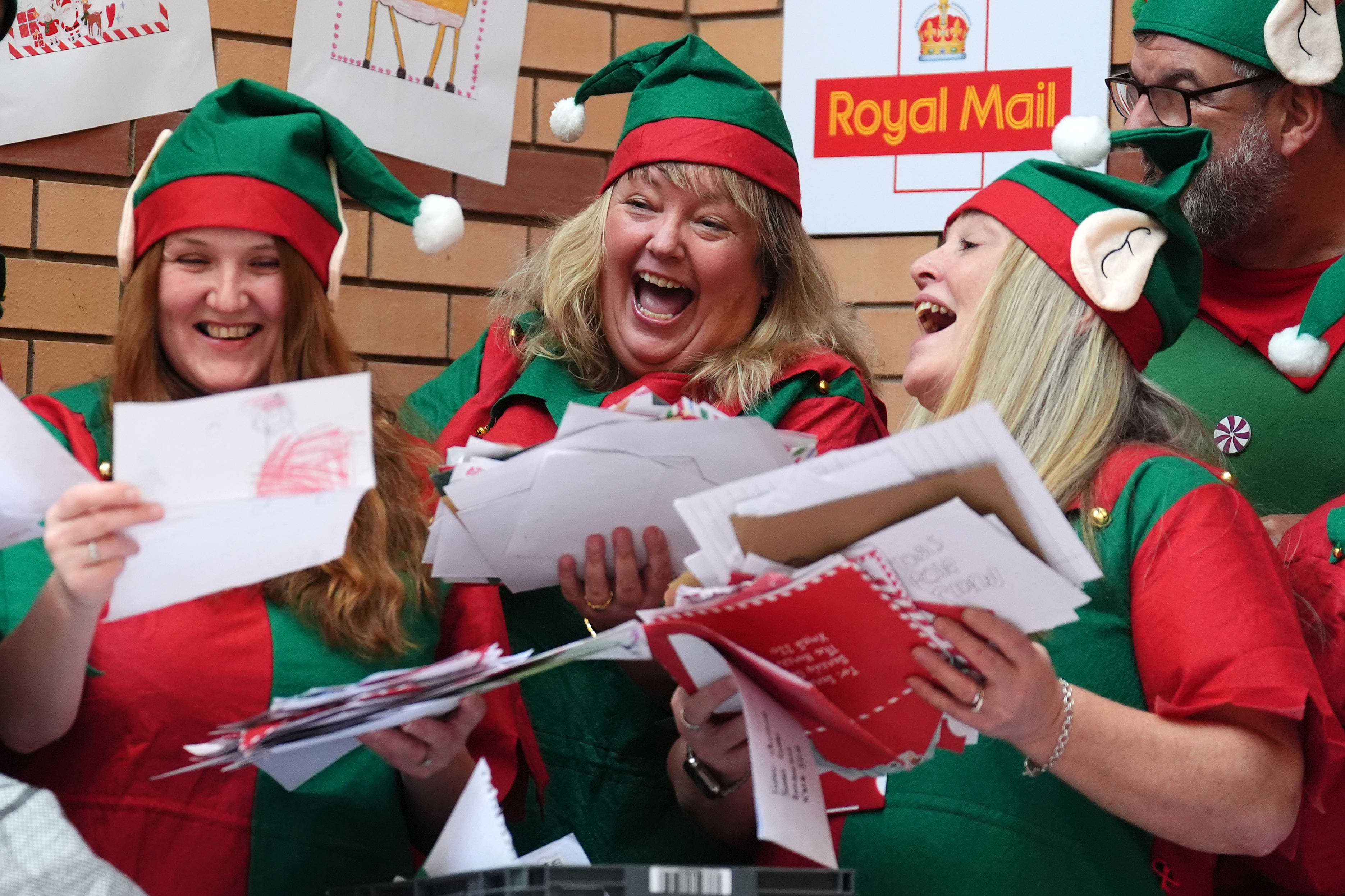 The dedicated team of Royal Mail staff help deal with the thousands of letters which arrive for Santa (Andrew Milligan/PA)