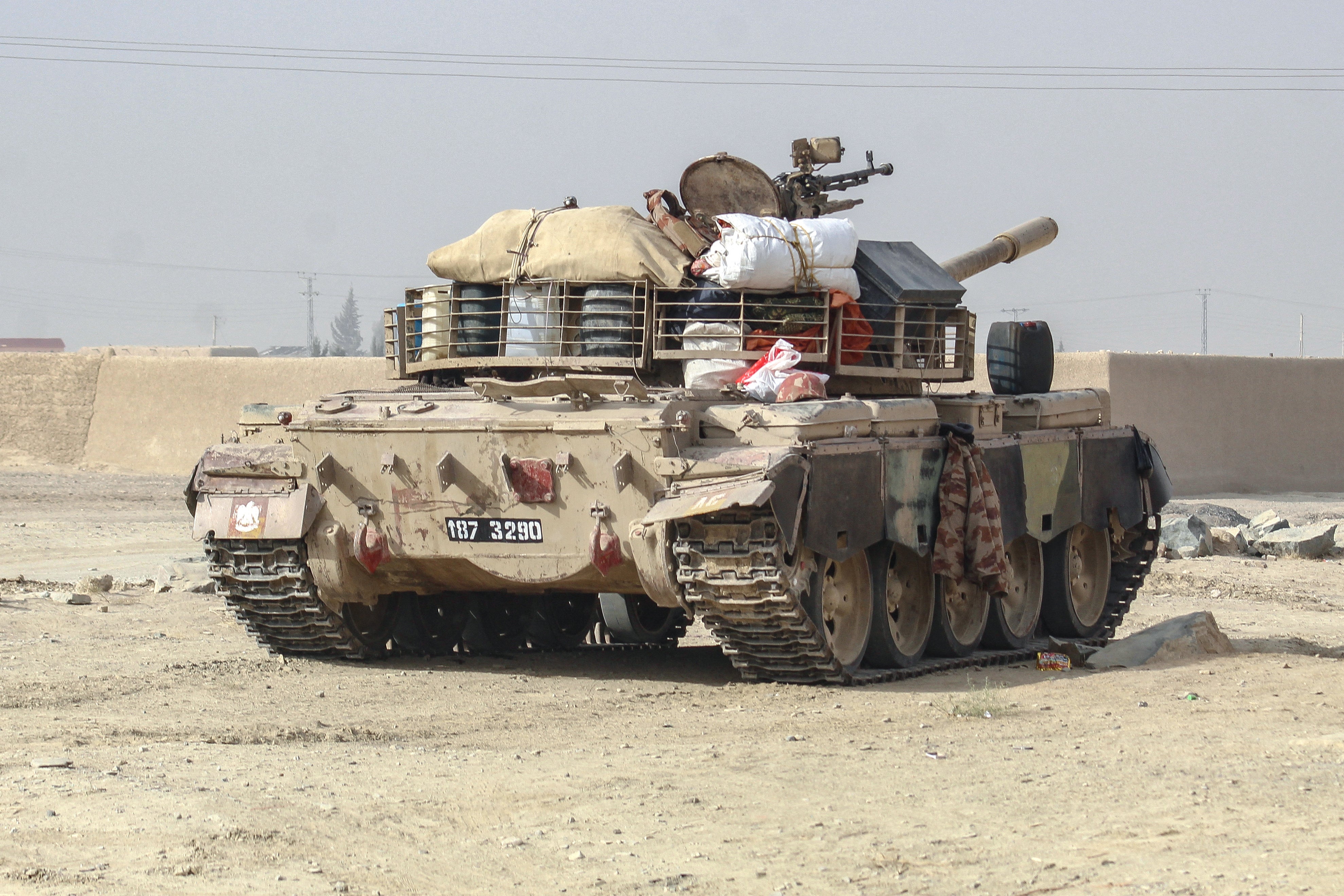 A Pakistani army tank stands at the Pakistan-Afghanistan border in Chaman on December 6, 2025, following overnight cross-border fire between the two countries