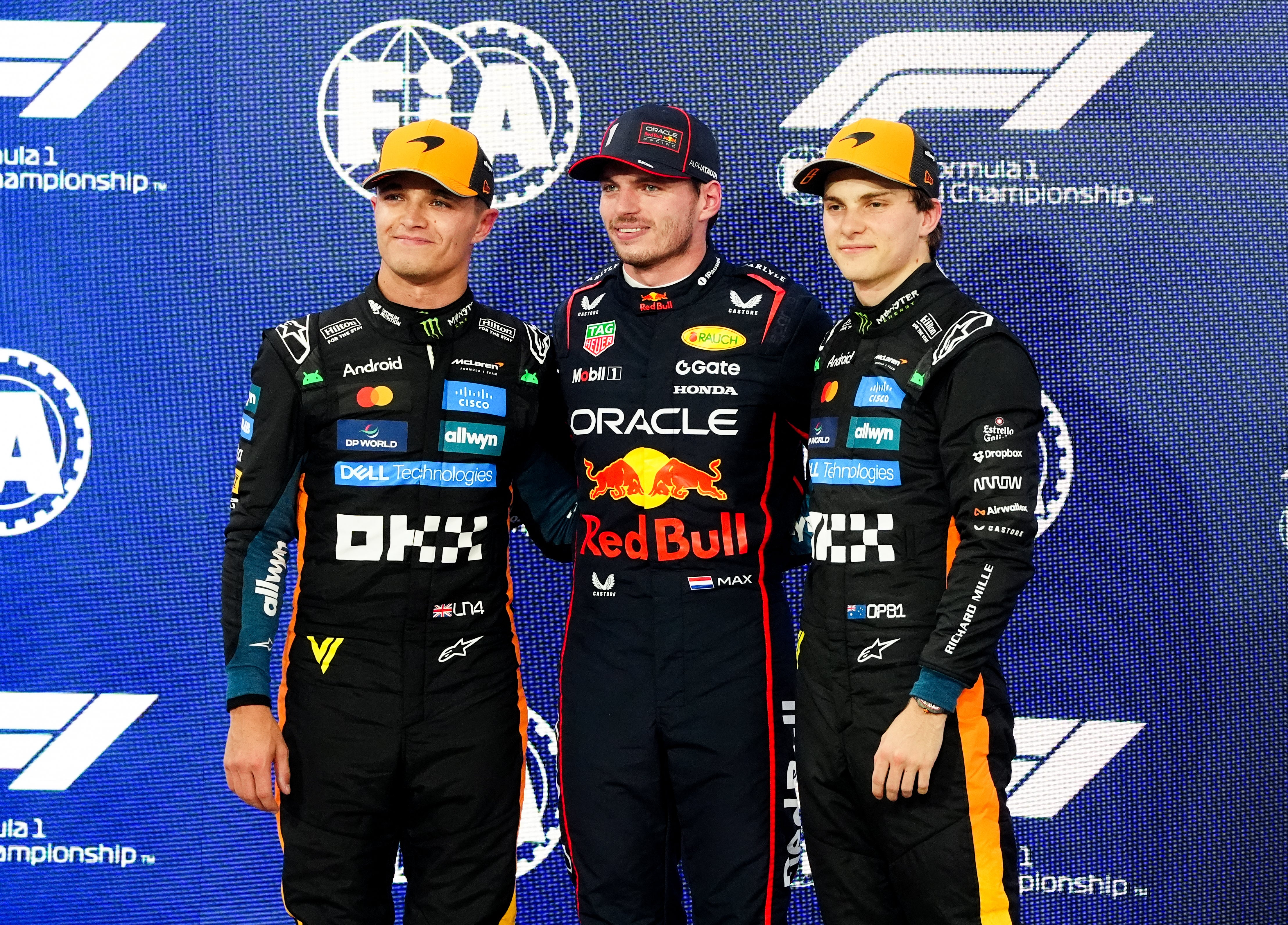 <p>McLaren drivers Lando Norris and Oscar Piastri with pole sitter Max Verstappen (David Davies/PA)</p>
