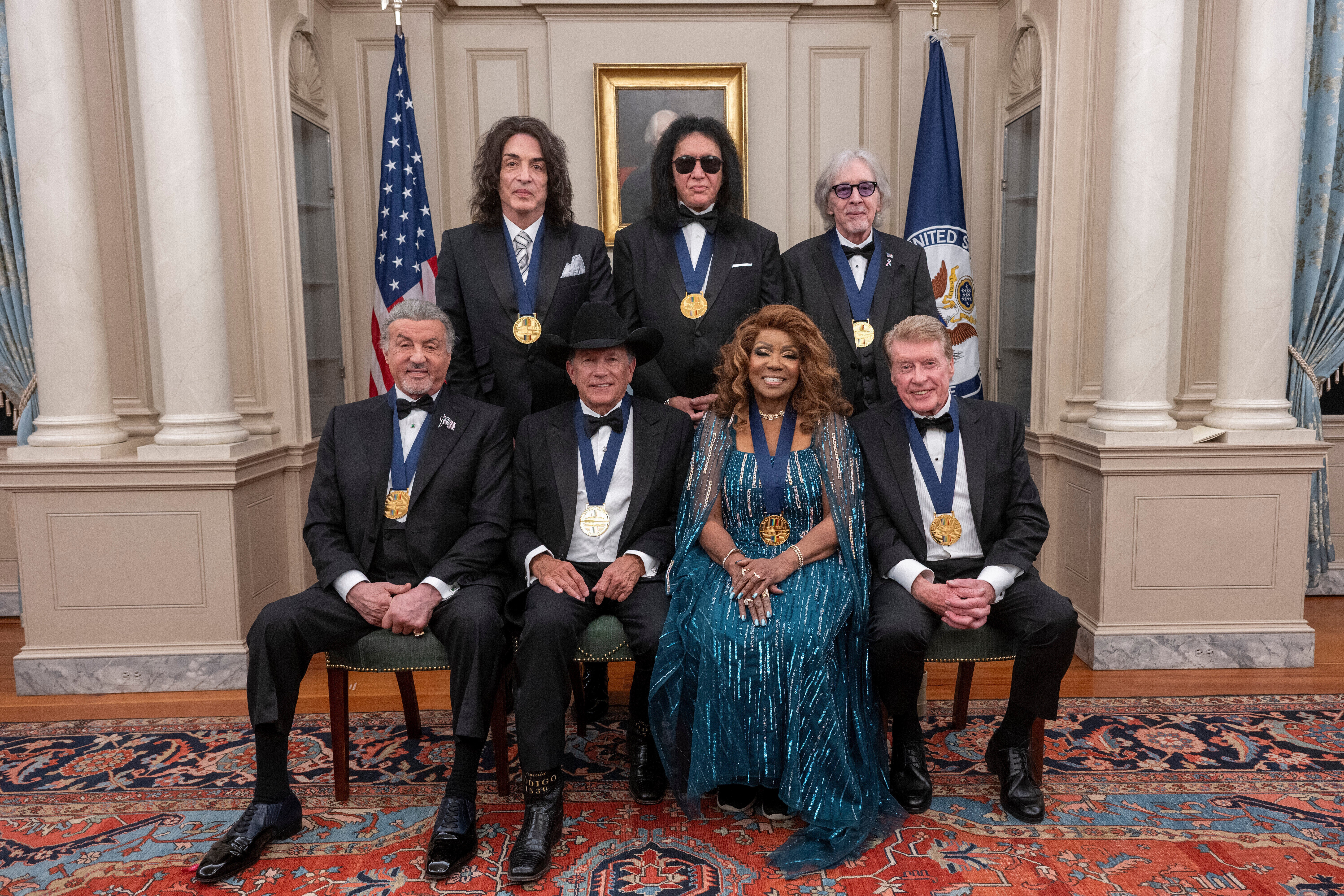 Trump’s Kennedy Center honorees pose with their medals at the White House on Saturday