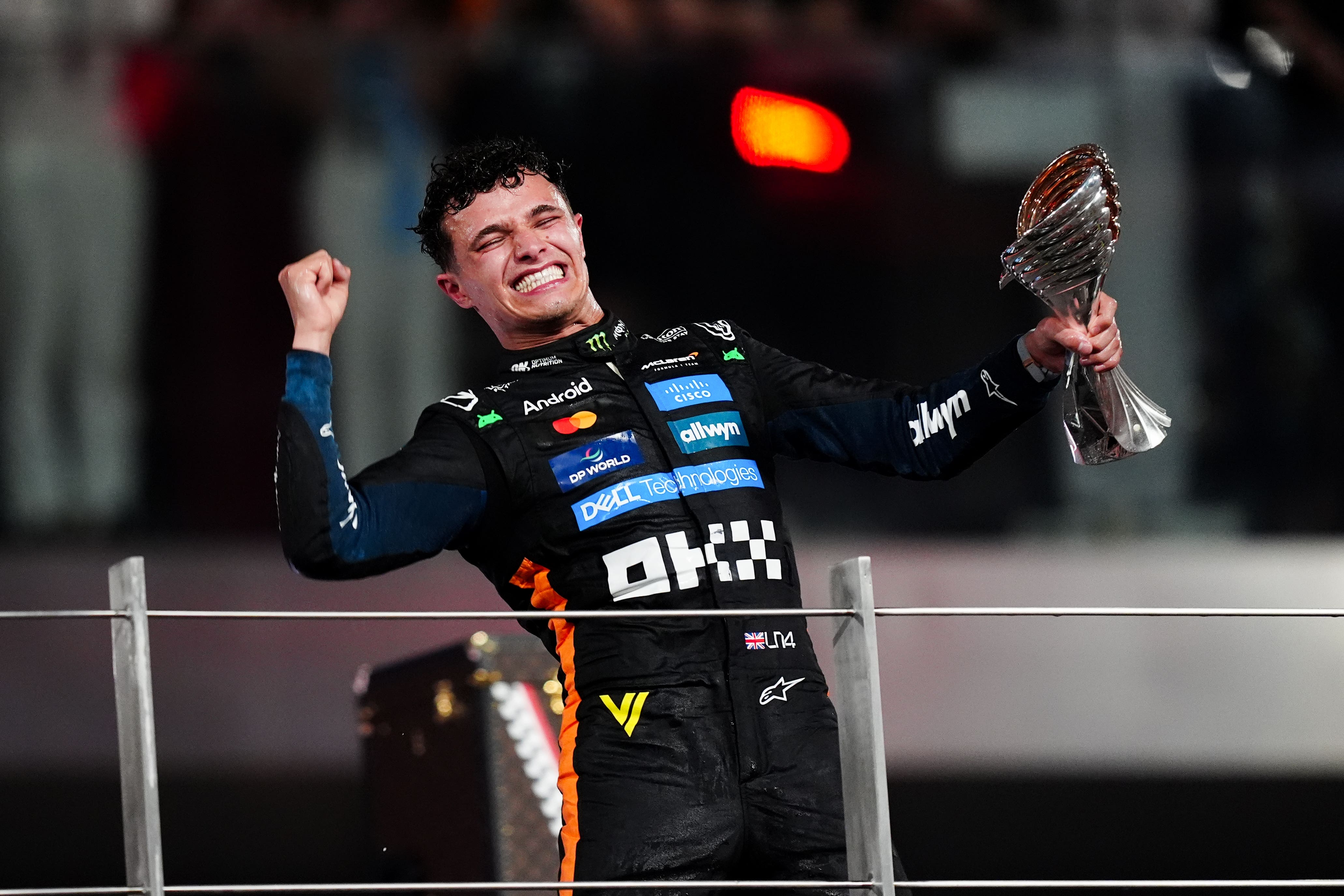 <p>McLaren driver Lando Norris celebrates winning the F1 world title (David Davies/PA)</p>