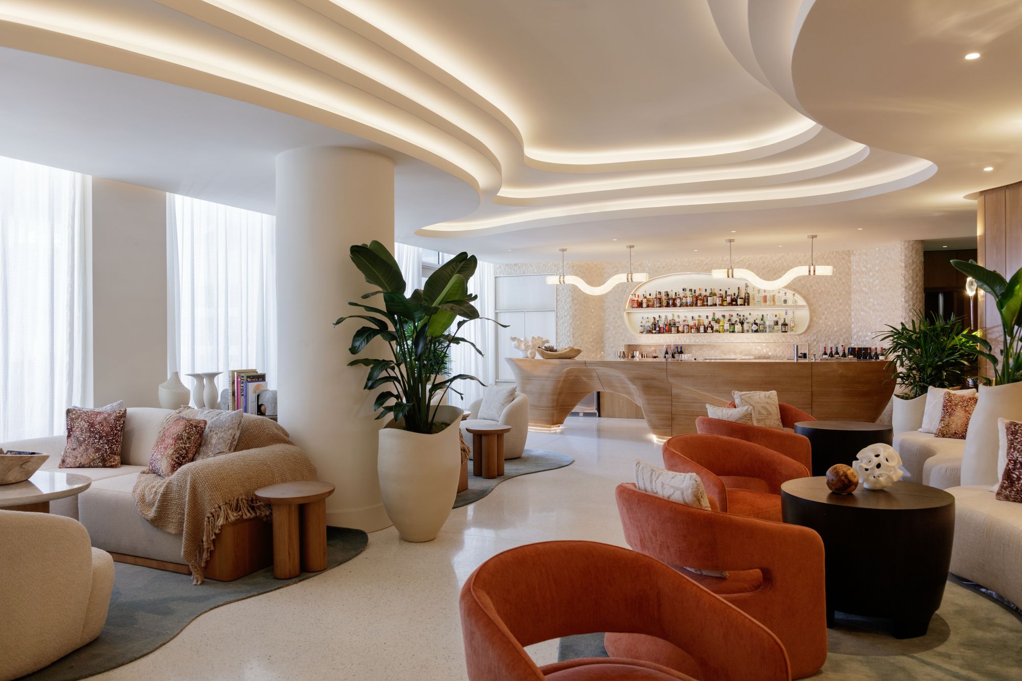 The interior of Andaz Miami Beach contains flourishes that fascinated Art Deco architects — curves, recurring motifs in groups of three, and face-like nuances