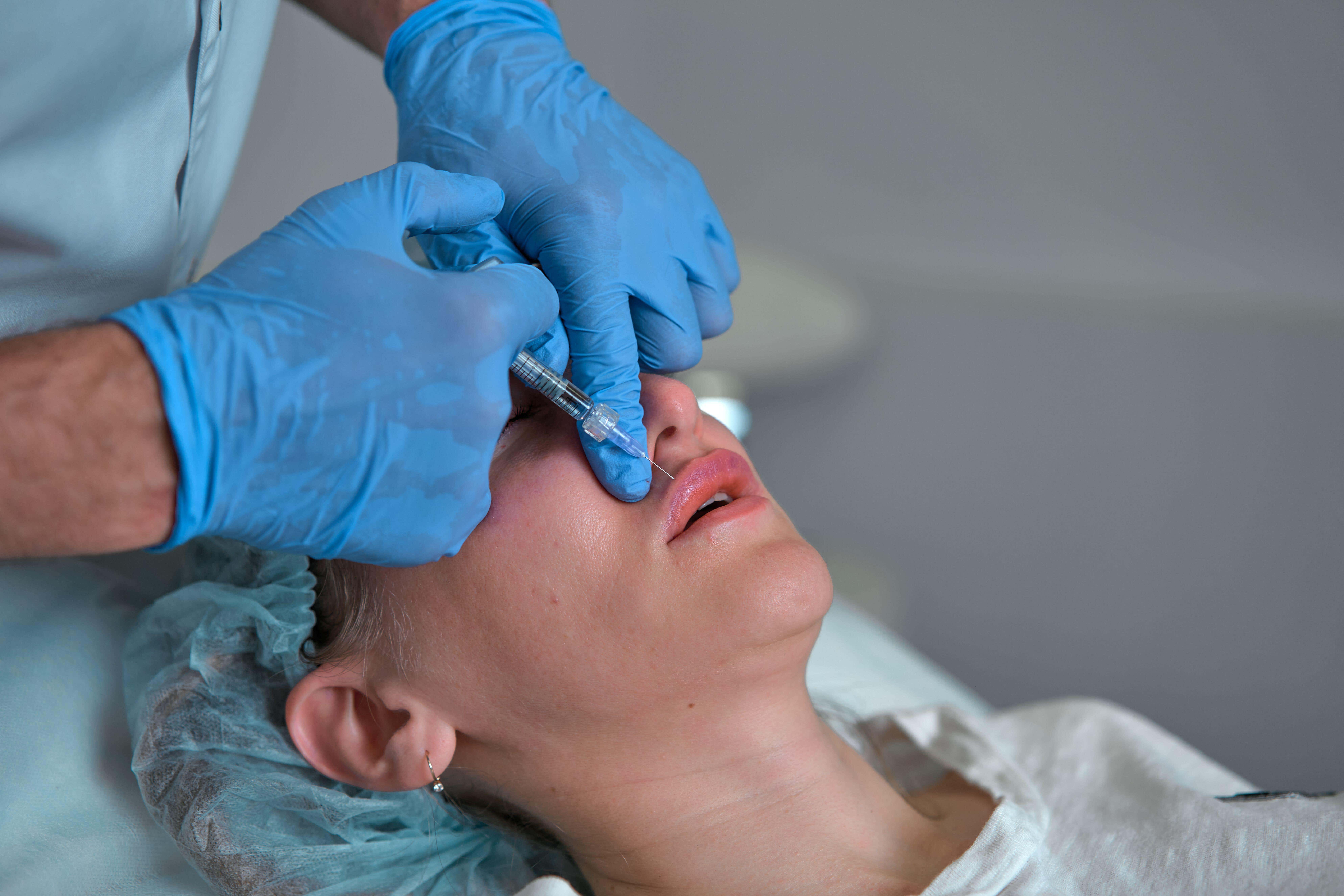 Advice Direct Scotland is calling for tighter restrictions on cosmetic procedures (Alamy/PA)