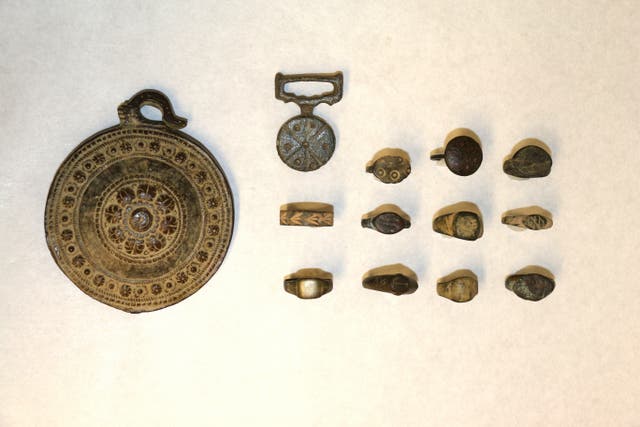 <p>The 11 rings and two medallions brought in from a thrift store in Chilliwack, B.C</p>