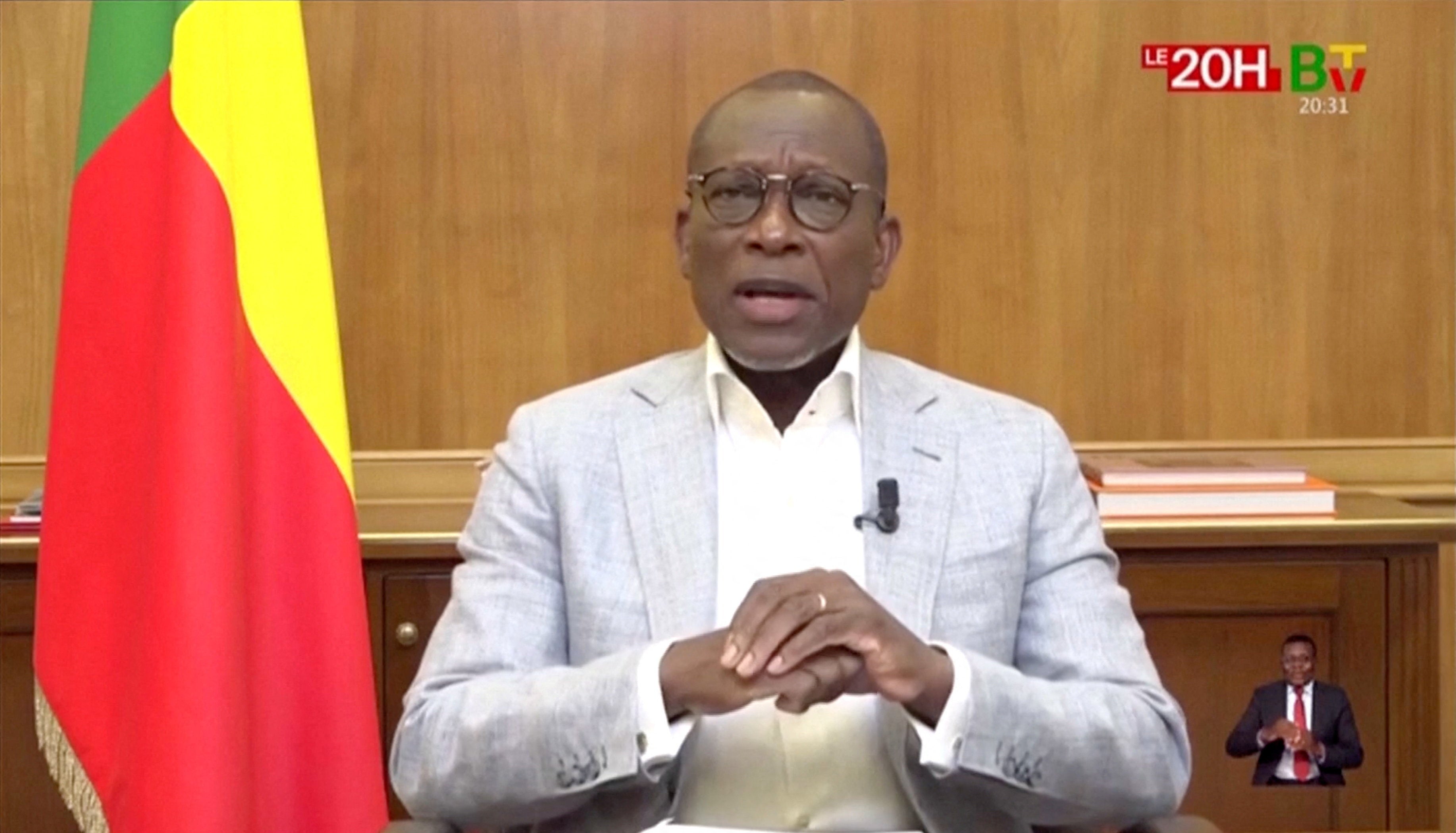 Benin President Patrice Talon addresses the nation on state broadcaster after coup attempt, in Cotonou