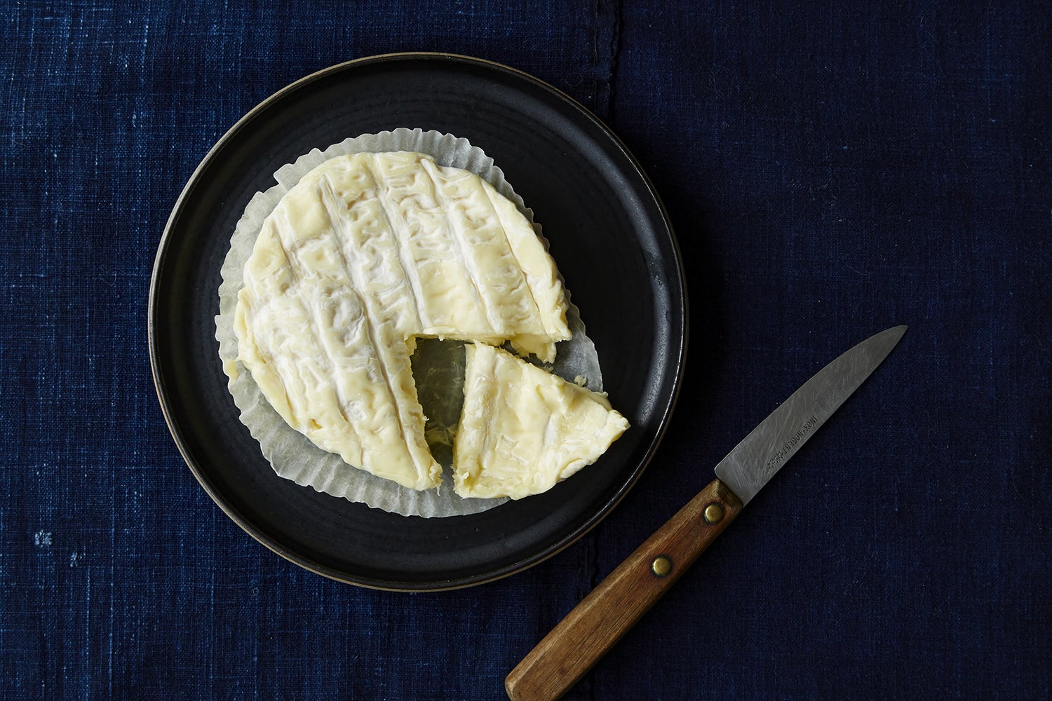 Saint-Félicien at peak ooze: soft-rind proof that Christmas cheese should never be shy