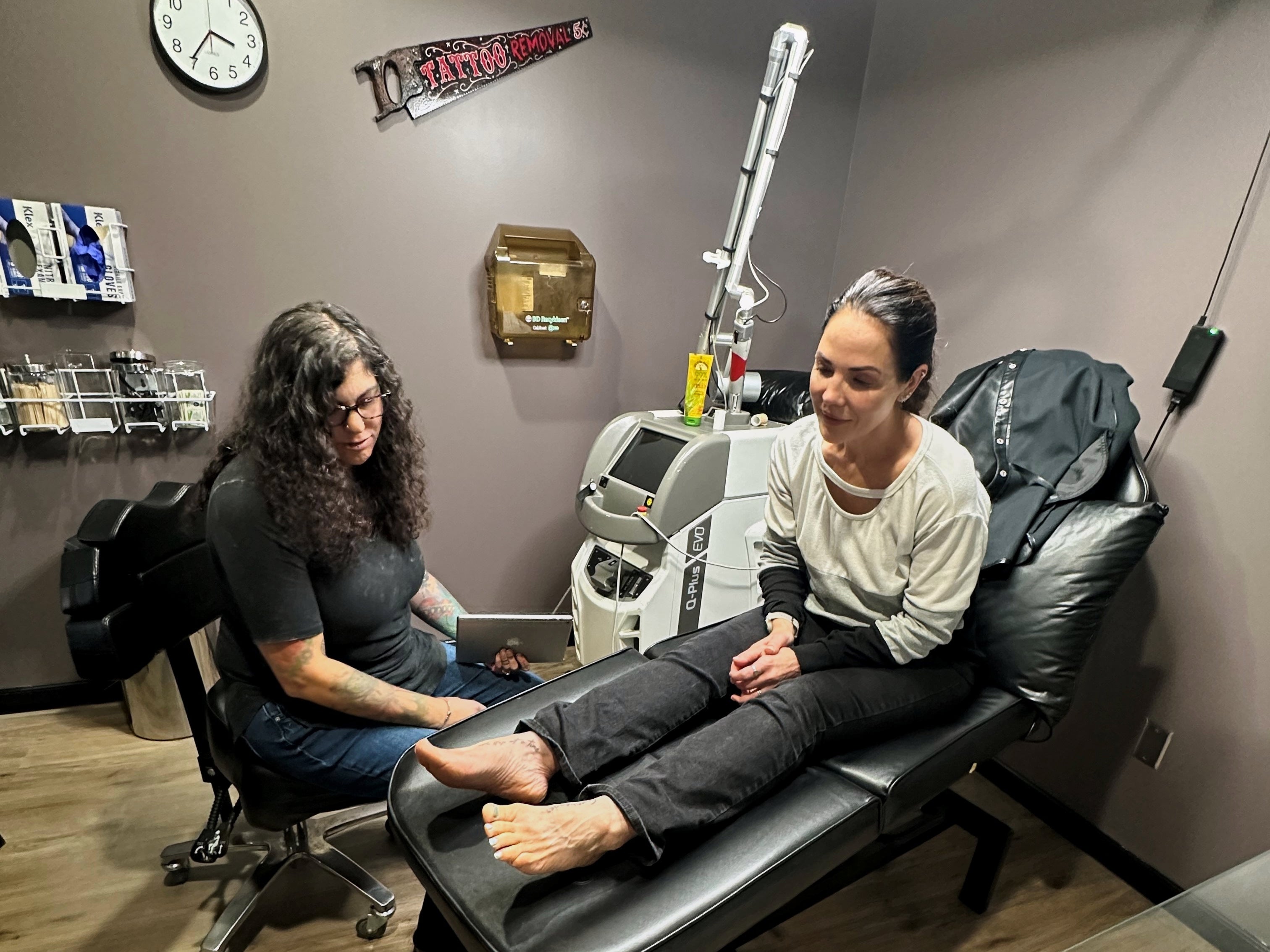 Tracy Herrmann has one of her tattoos removed by Chroma Tattoo Studio Laser Tattoo Removal owner Jaime Howard