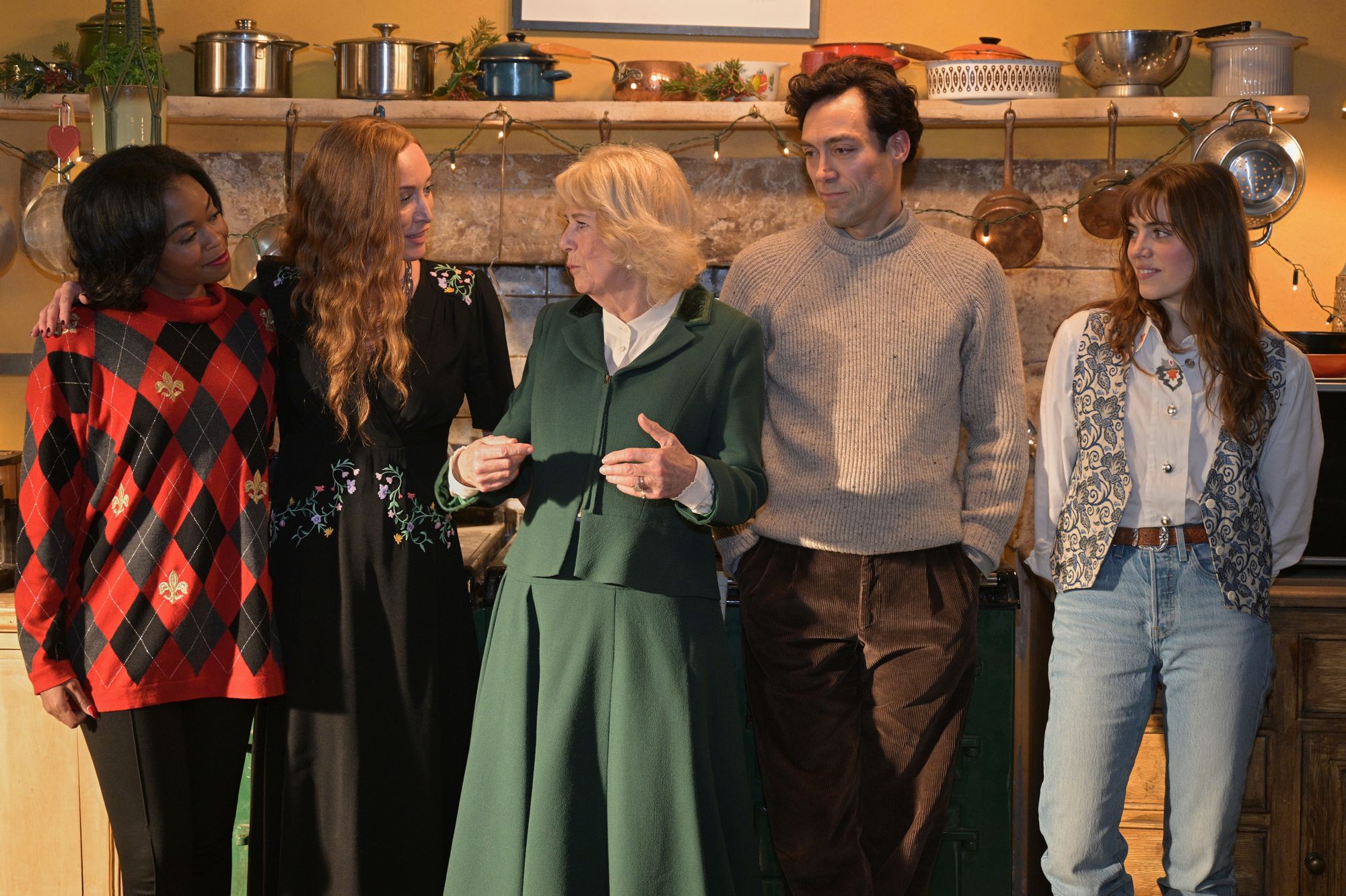 Queen Camilla poses with actors Nafessa Williams (L), Victoria Smurfit (2nd L), Alex Hassell (2nd R) and Bella Maclean