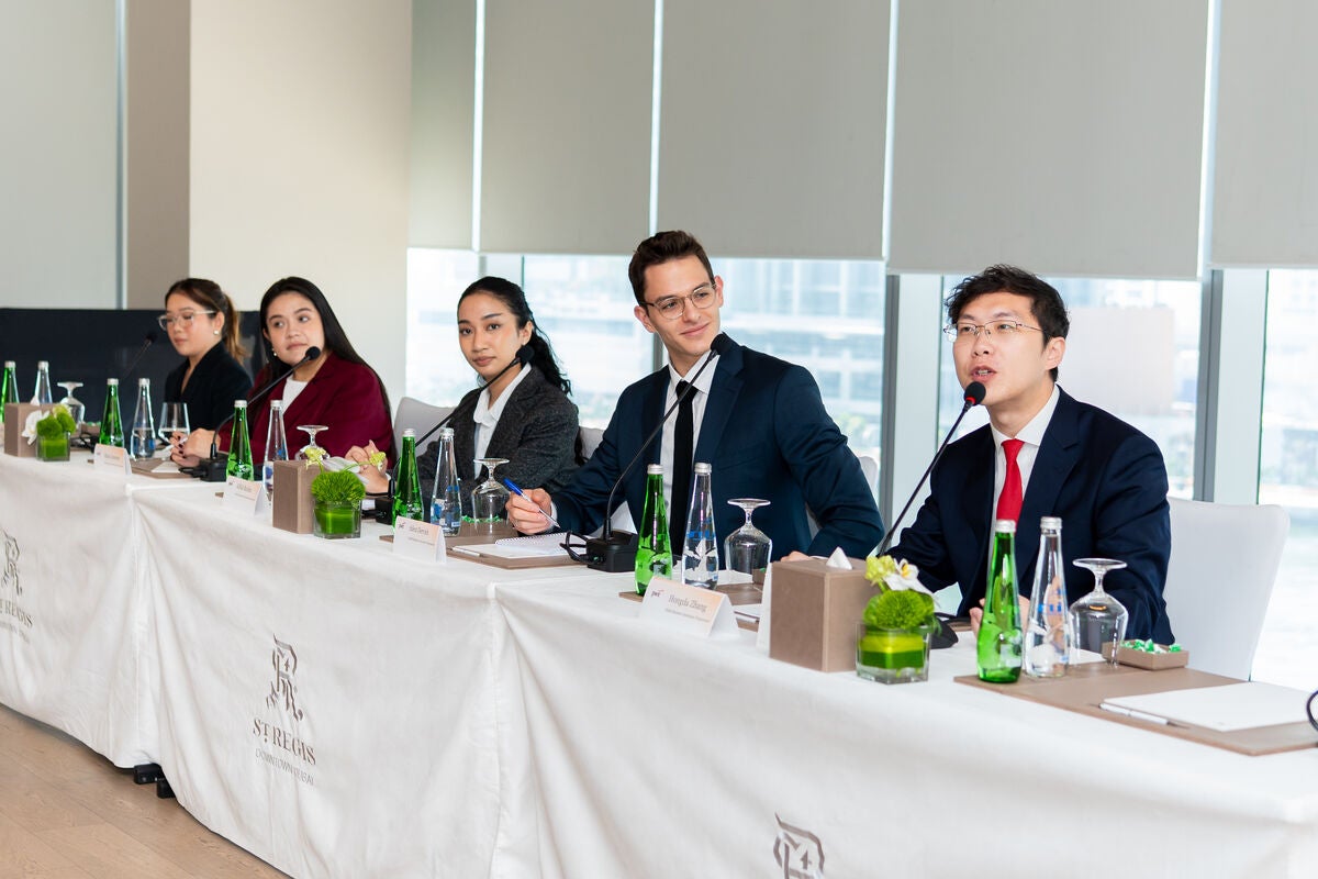 Young talent working in a dynamic, multicultural environment — the kind of setting drawing more graduates to Dubai each year