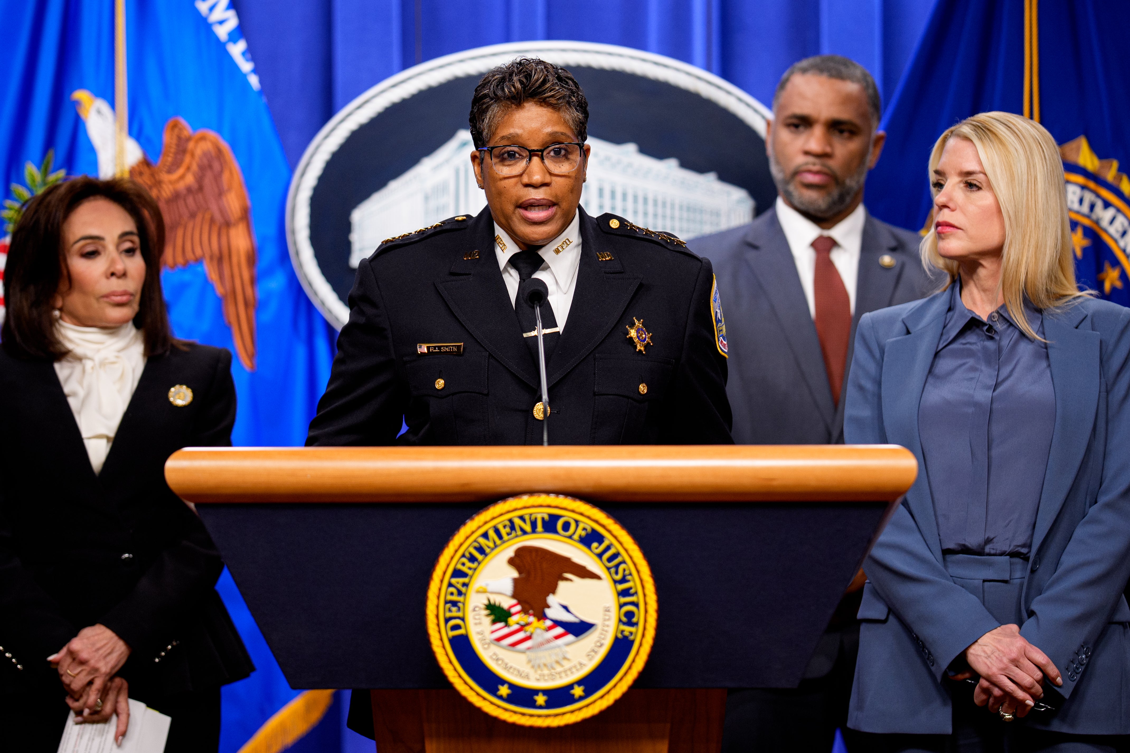 Metropolitan Police Department Chief of Police Pamela Smith speaks during a news conference on an arrest of a suspect in the January 6th pipe bombing case at the Department of Justice on December 4, 2025 in Washington, DC