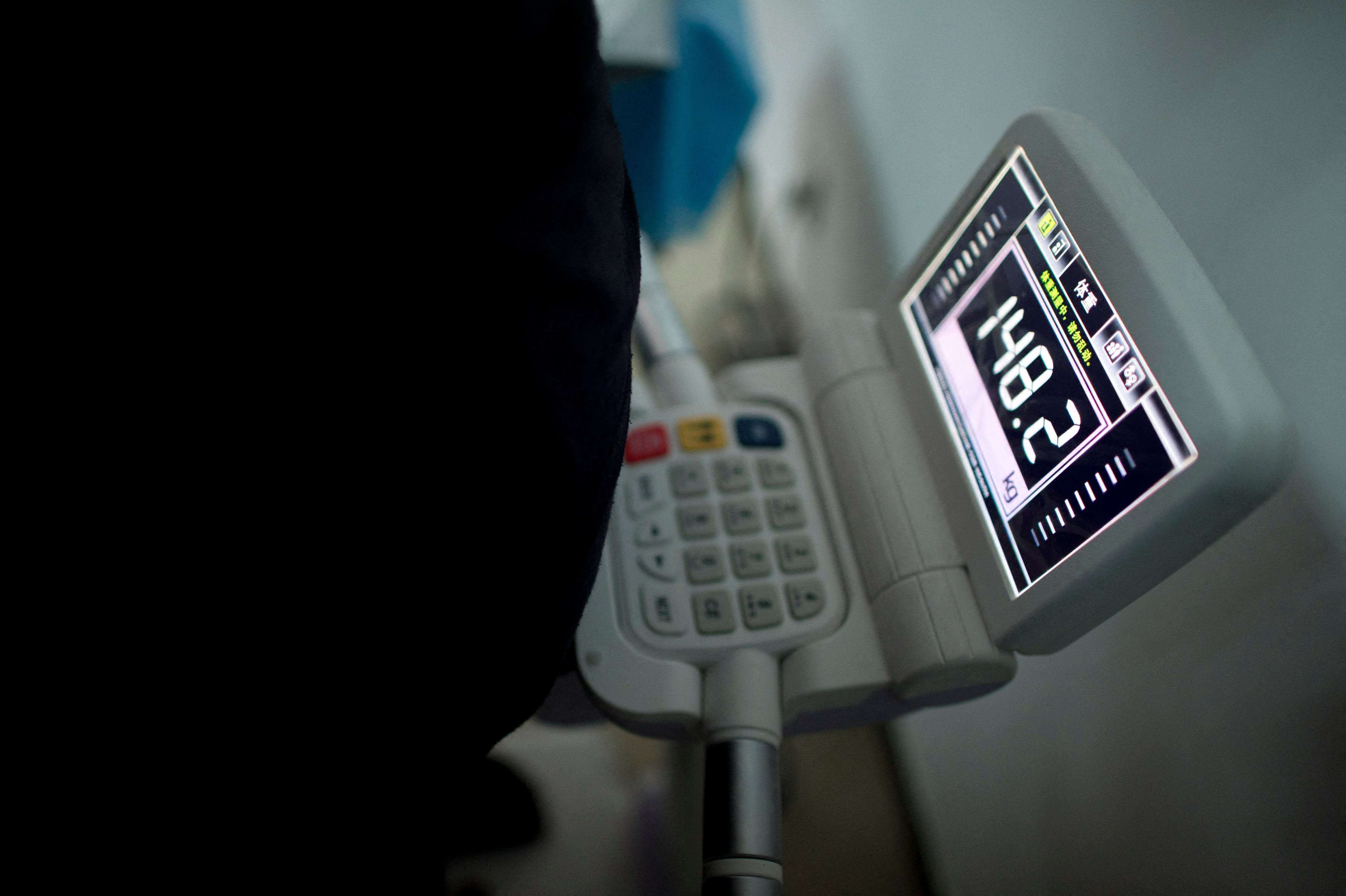 <p>File. Scale shows weight of a child during at a hospital in Beijing</p>