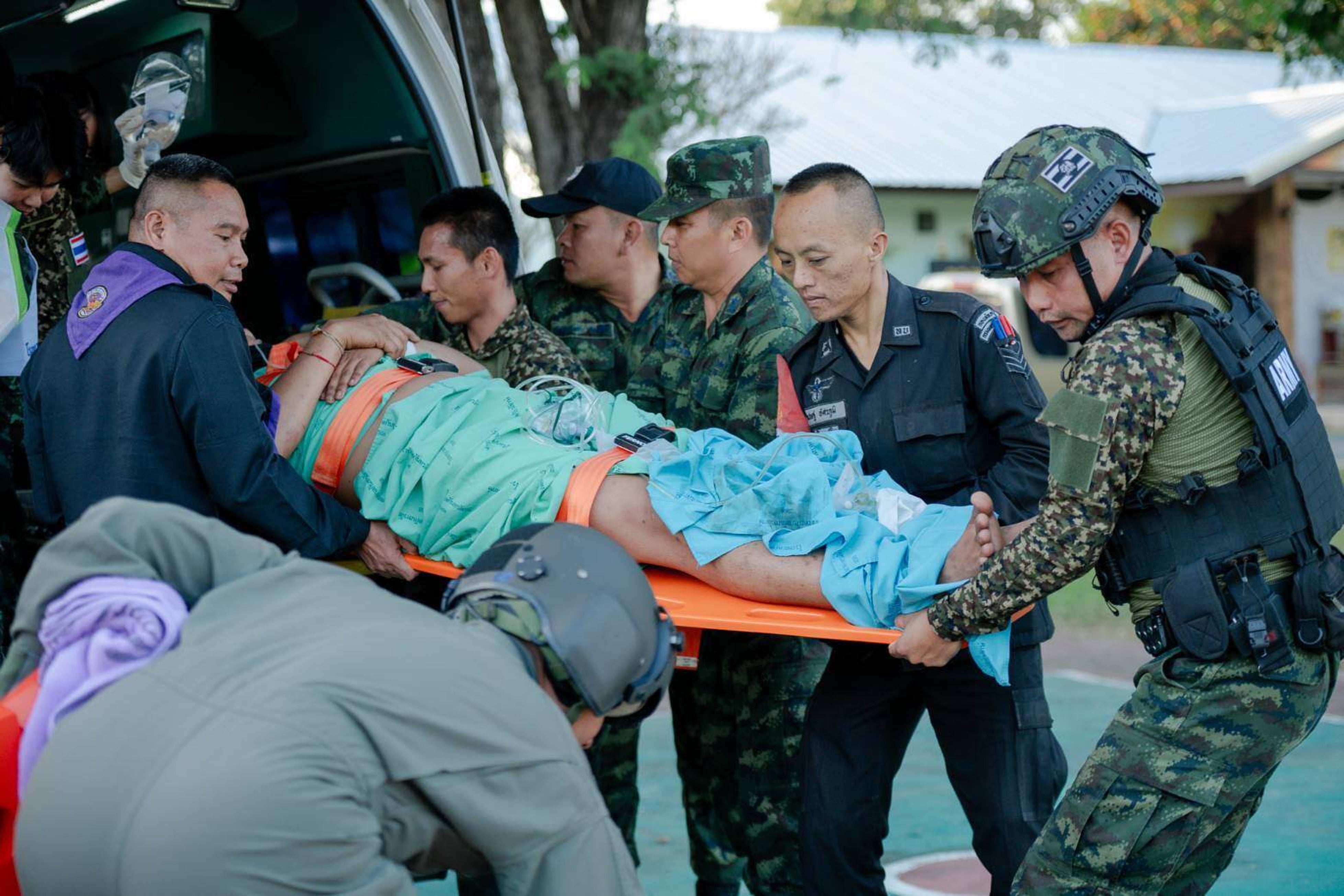 <p>In this photo released by Royal Thai Army, a wounded Thai soldier is carried to be transferred to a hospital in Sisaket province, Thailand, Sunday</p>