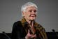 What is age-related macular degeneration, the condition Dame Judi Dench suffers from?