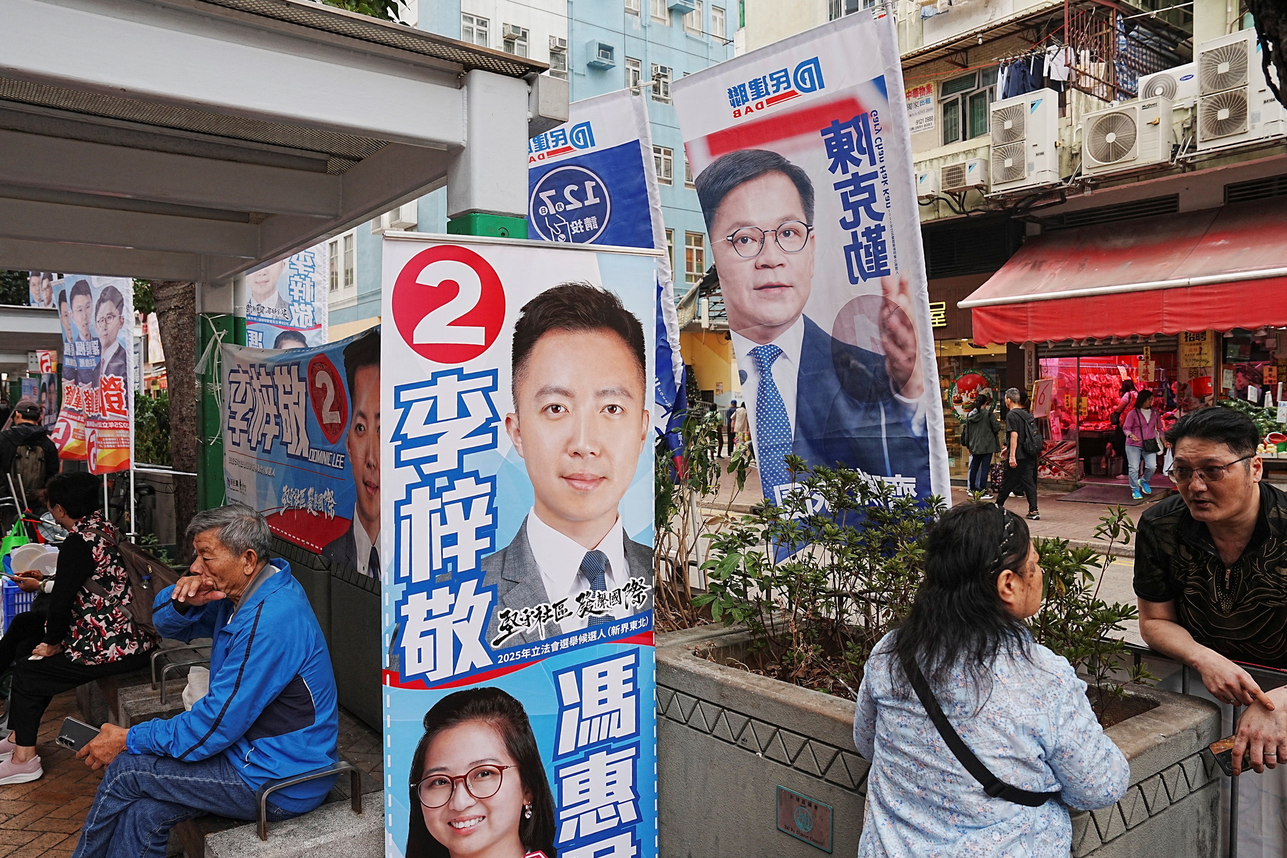 Campaign flags and banners in Tai Po during the Legislative Council general election in Hong Kong, China, 7 December 2025