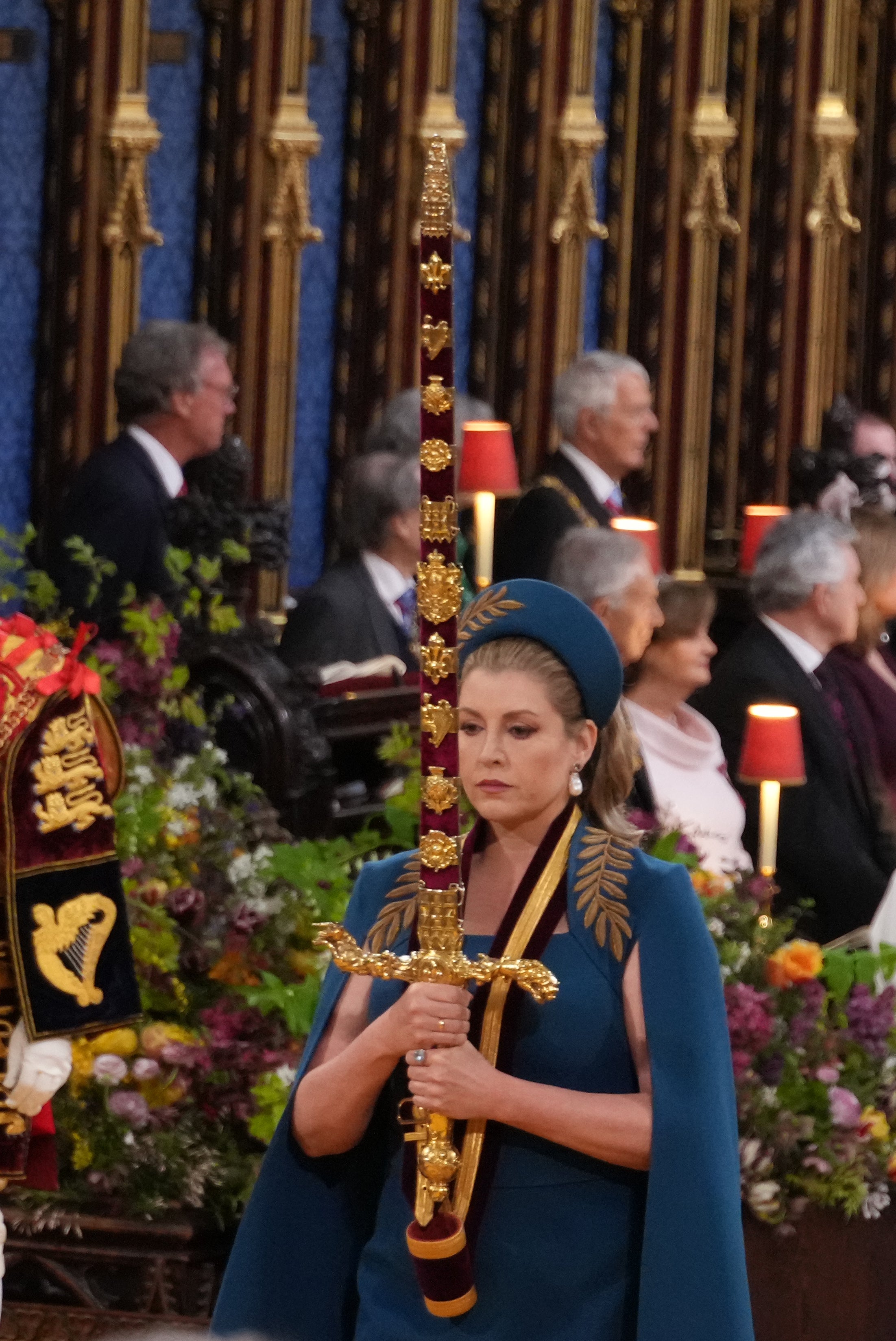 Penny Mordaunt carrying the Sword of State at the coronation