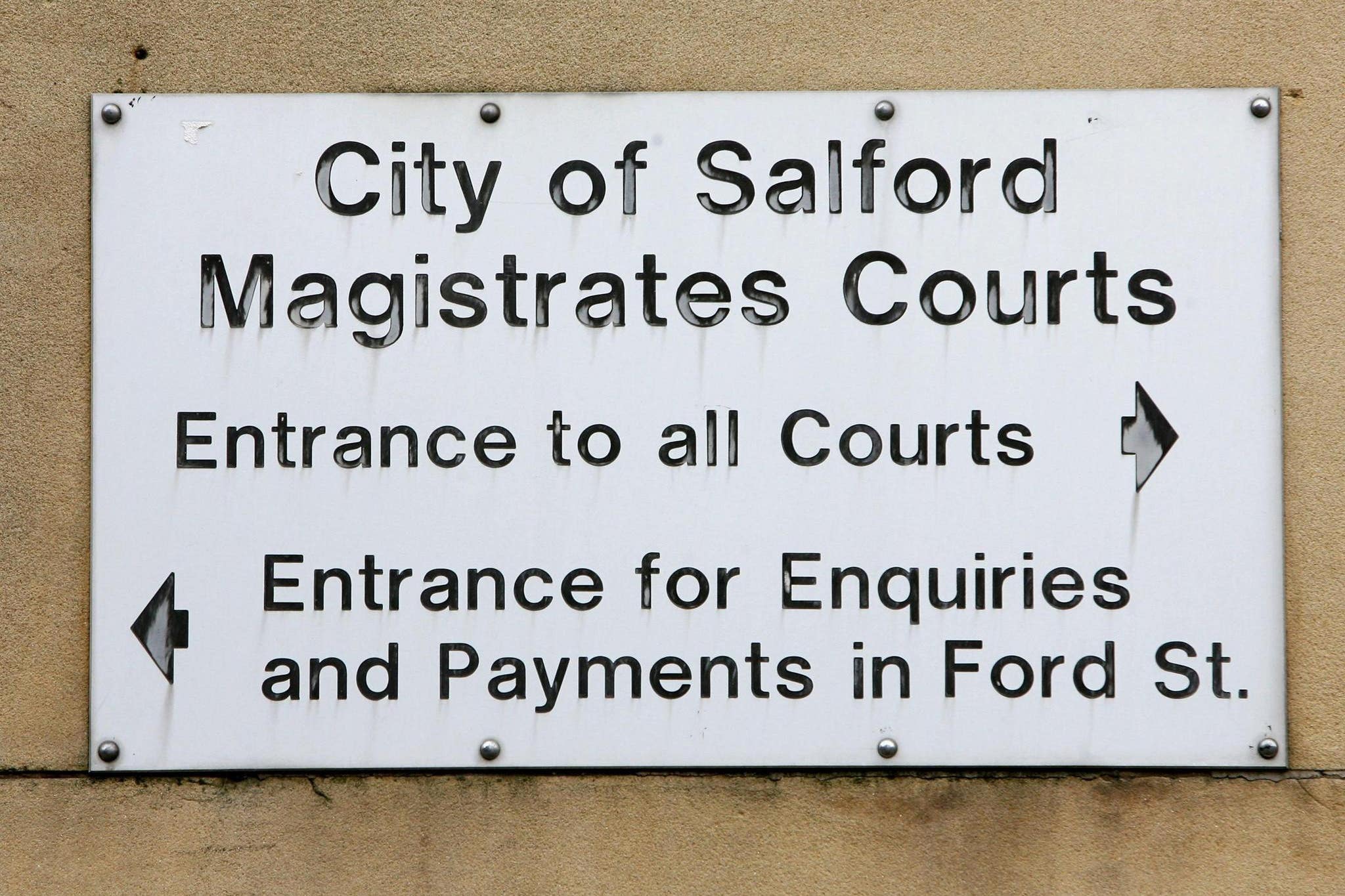 A sign for Salford Magistrates’ Court (Peter Byrne/PA)