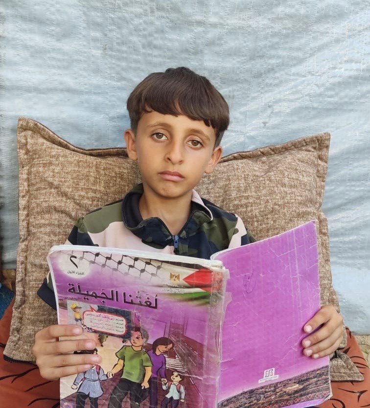 Struggling to catch up: Hassan at home