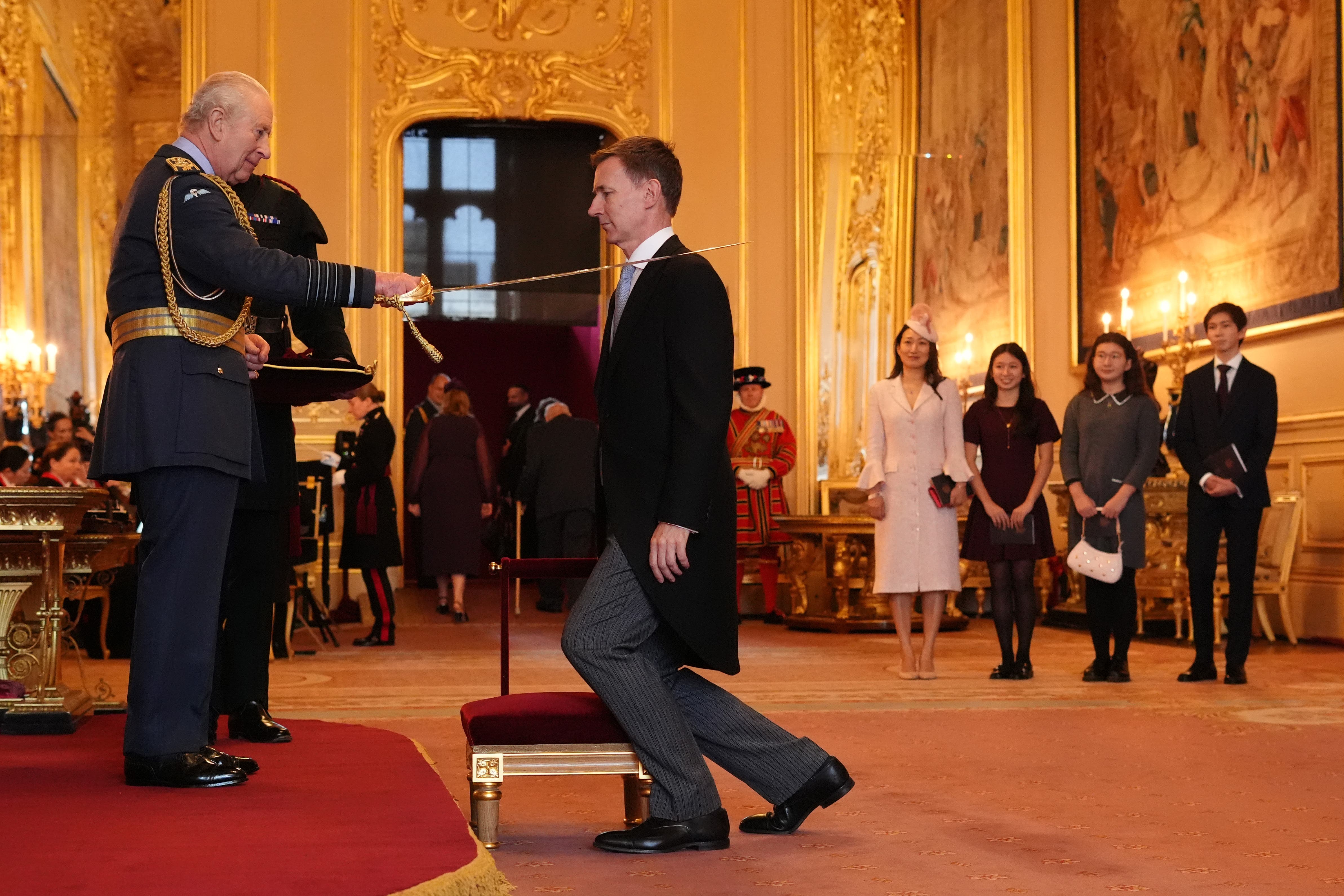 Sir Jeremy Hunt received a knighthood at Windsor Castle on Tuesday (Jonathan Brady/PA)