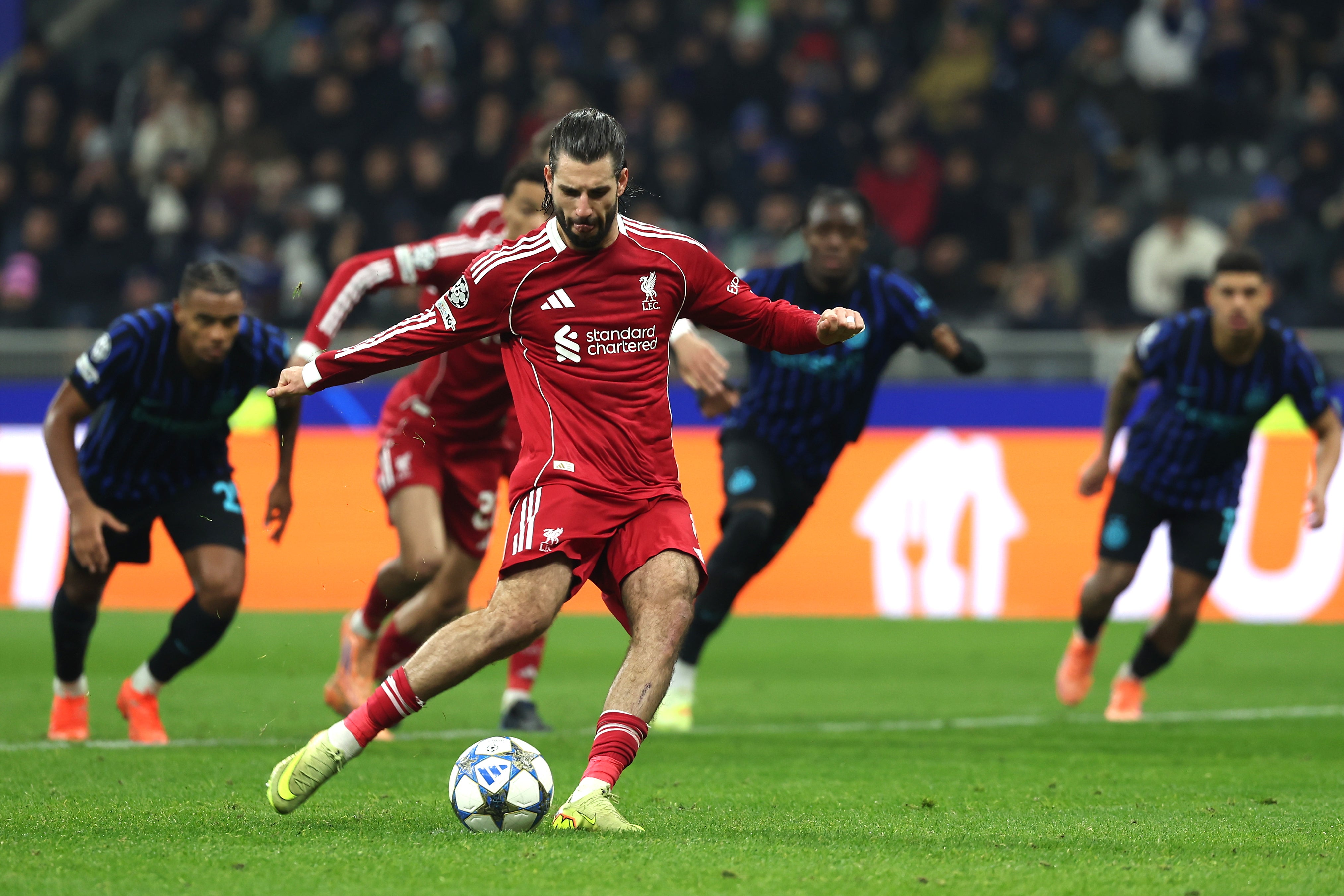 Dominik Szoboszlai scores from the penalty spot