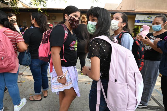 <p>Students arrive for the first day of the school year at Grant Elementary School in Los Angeles, California, in August 2021. A new study shows that school reopenings in the state greatly improved  students’ mental health</p>