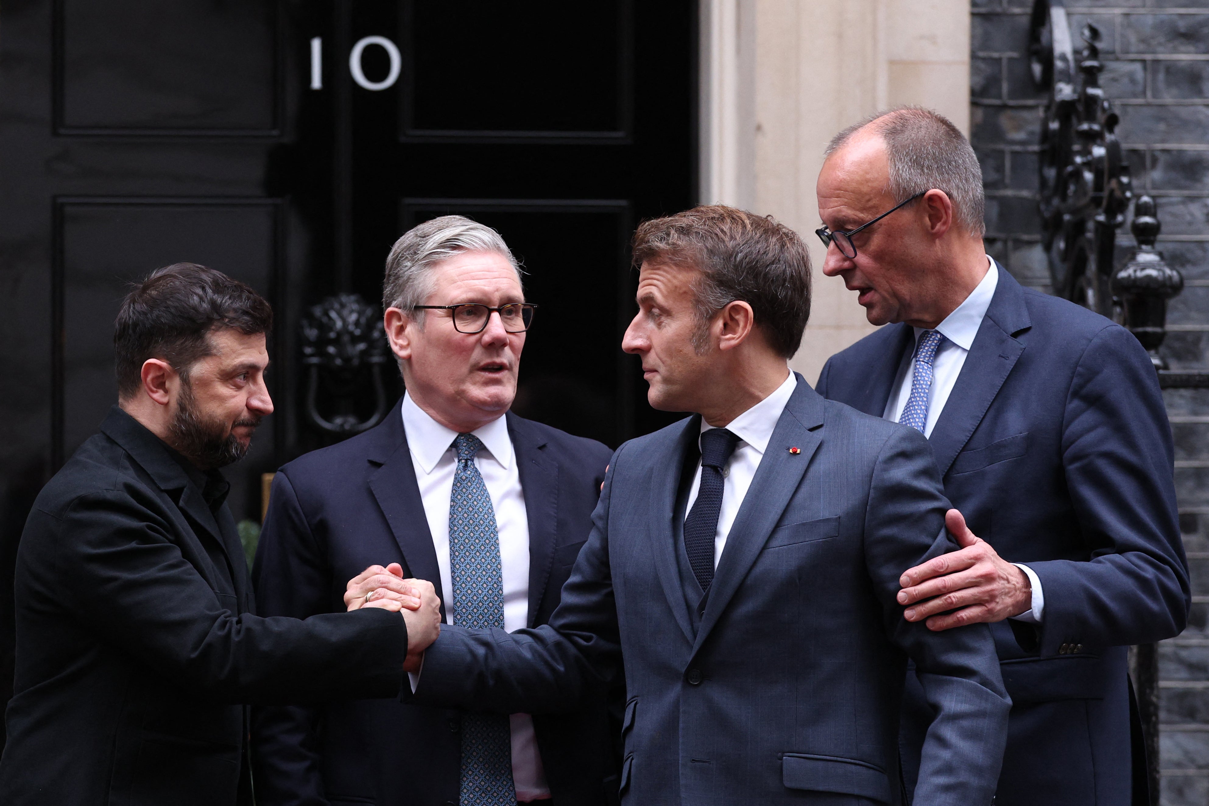 Ukraine’s president Volodymyr Zelensky, Britain’s prime minister Keir Starmer, France’s president Emmanuel Macron and Germany’s chancellor Friedrich Merz chat on the 10 Downing Street doorstep after a meeting in central London