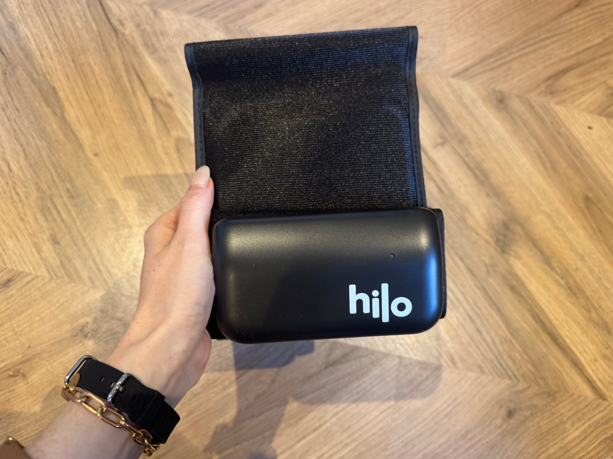 The monitor offers both a continuous wearable and an armband that connect to an app