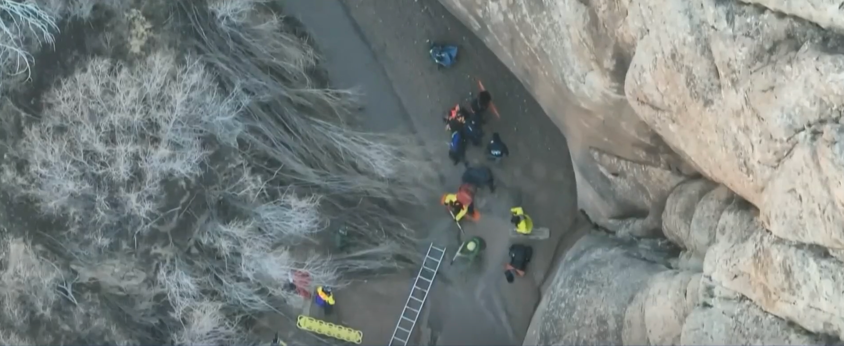 Austin Dirks was in Arches National Park in eastern Utah when he became stuck in quicksand. He is seen on drone footage trapped in a remote area