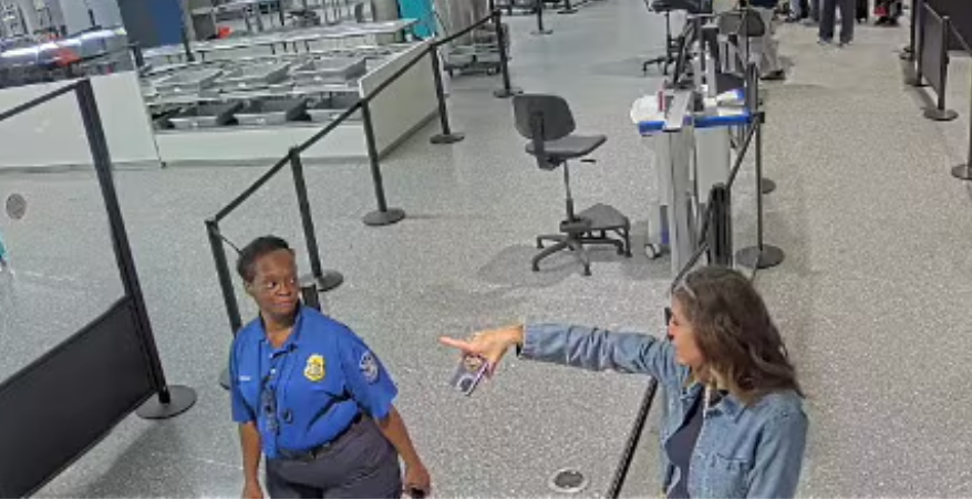 This security camera still shows Congresswoman Nancy Mace, right, allegedly berating a security worker at the Charleston International Airport in South Carolina in October 2025. Mace claims she never berated anyone and insists accusations that she did are a “political hit job” by her 2026 gubernatorial primary rival South Carolina Attorney General Alan Wilson
