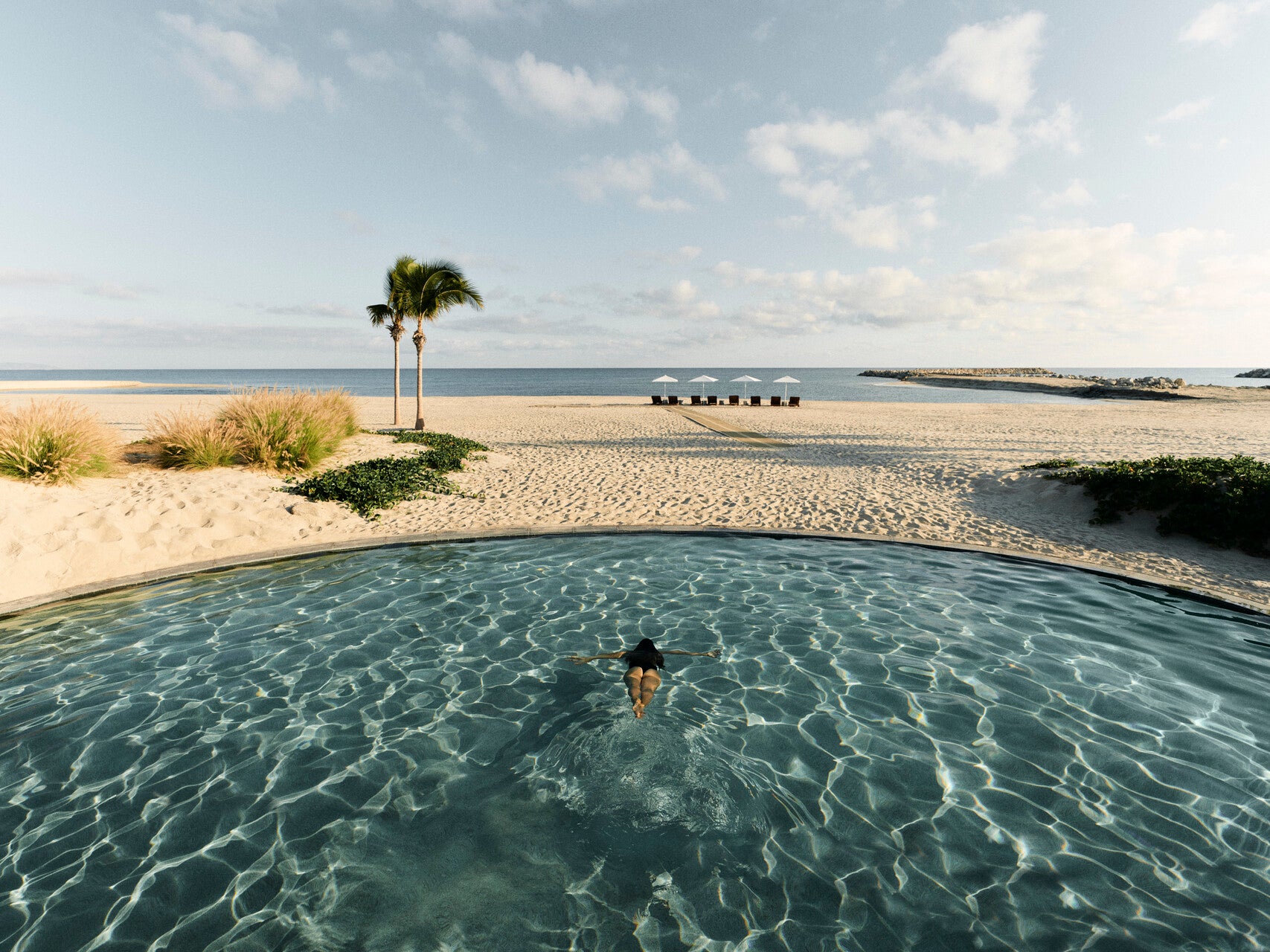 There are seven swimming pools and a sweeping beach to alternate between