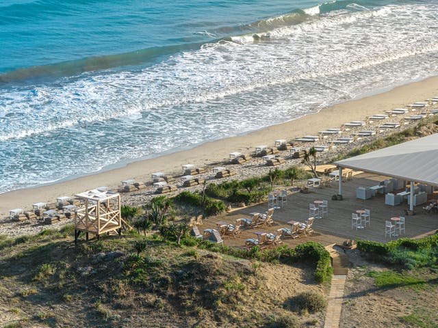 <p>LUXME Costa Botanica looks onto a beautiful white-sand beach in Corfu</p>