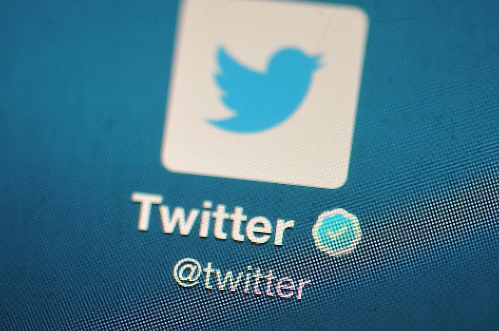 The Twitter logo is displayed on a mobile device on 7 November, 2013 in London, England