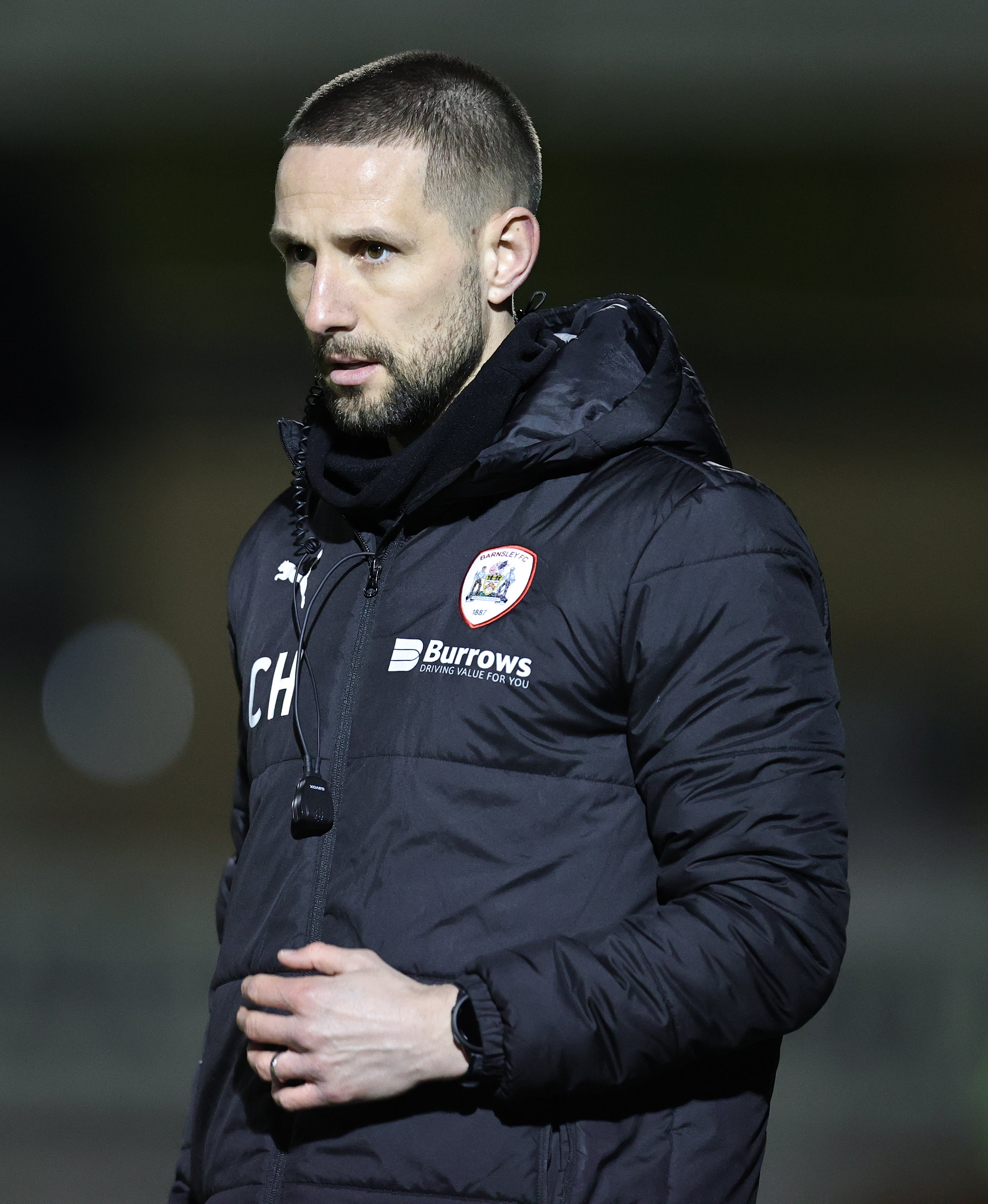 Barnsley assistant head coach Conor Hourihane looks on