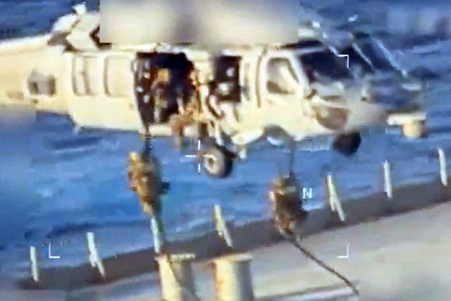 <p>A screengrab shows a grainy image of the recent US raid on a Venezuelan oil tanker</p>