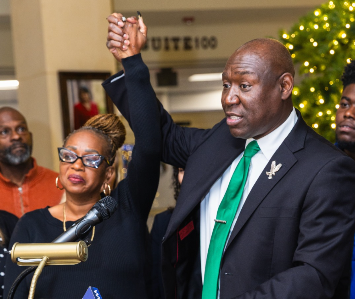Attorney Ben Crump with the widow of reverend Lewis Butler, who was shot in an attempted armed robbery in Florida in November 2023. The security guard’s family has been awarded a $779 million payout