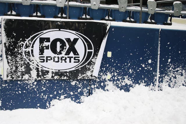 <p>The Fox Sports logo on the wall at Lumen Field before the game between the Seattle Seahawks and Chicago Bears on December 26, 2021 in Seattle, Washington</p>