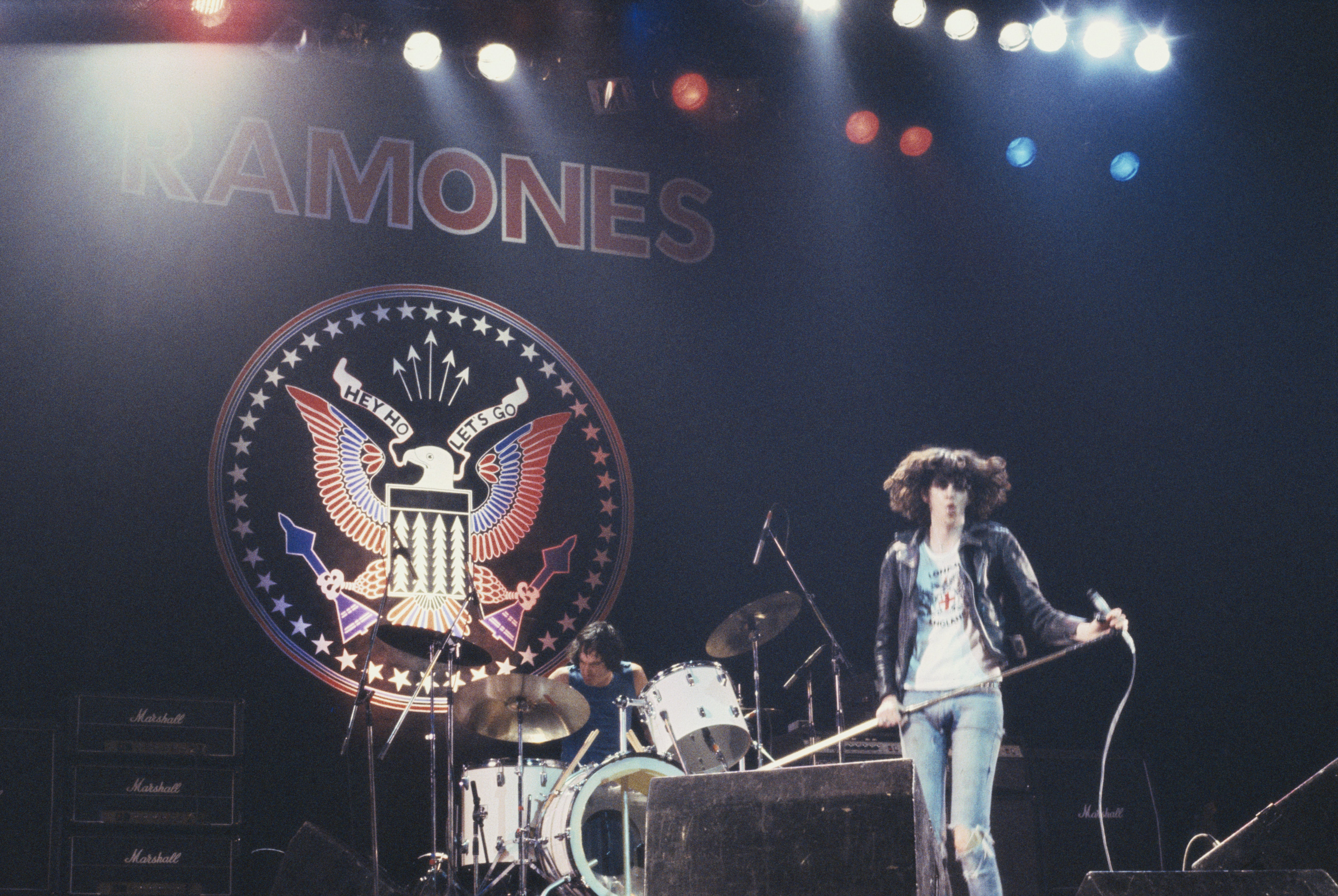 Joey Ramone, with drummer Tommy Ramone in the background, onstage in 1977. Ramones were well past their late-Seventies punk prime by the time they recorded “Merry Christmas (I Don’t Want To Fight Tonight)” in 1987