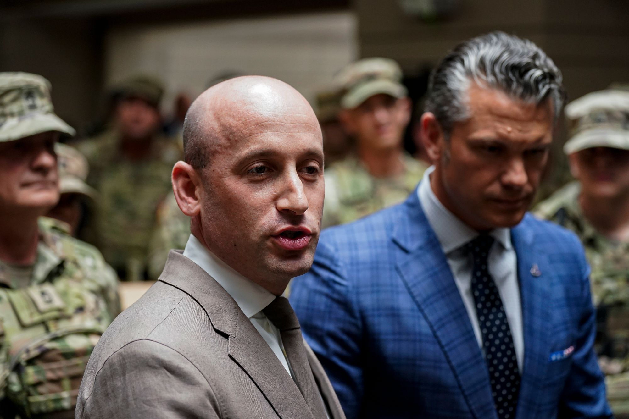 Newsom also took aim at Defense Secretary Pete Hegseth (right) and White House Deputy Chief of Staff Stephen Miller (left)