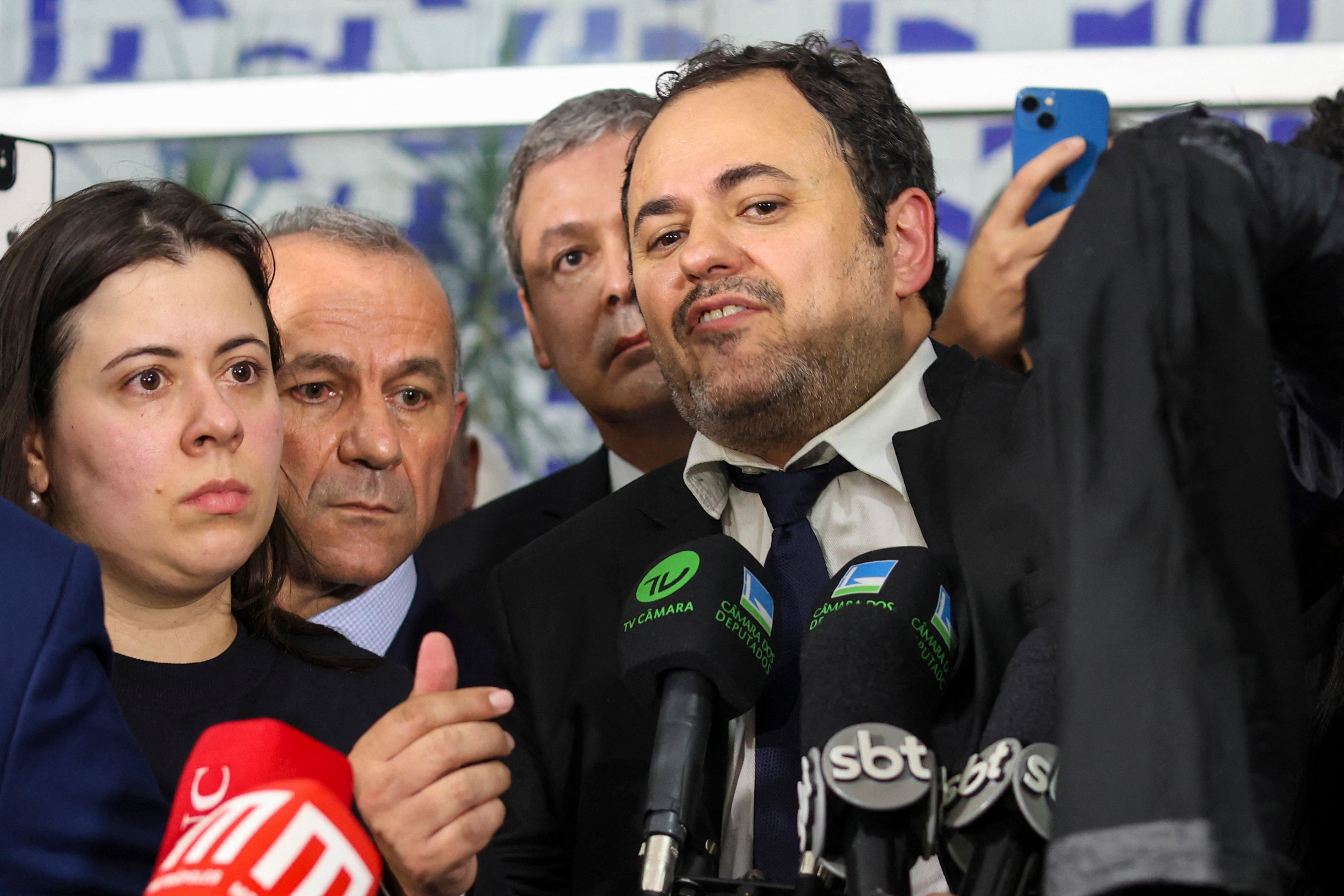 Brazilian Congressman Glauber Braga (C) speaks with the media after being removed from the lower house of parliament, ahead of the vote on a bill to reduce the sentence of former president Jair Bolsonaro
