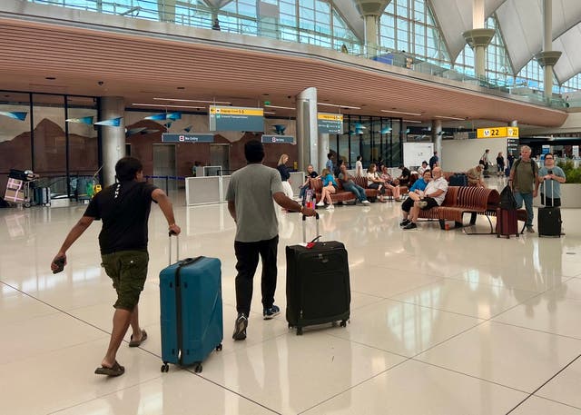 <p>Welcome to America? Passengers at Denver International Airport, Colorado  </p>