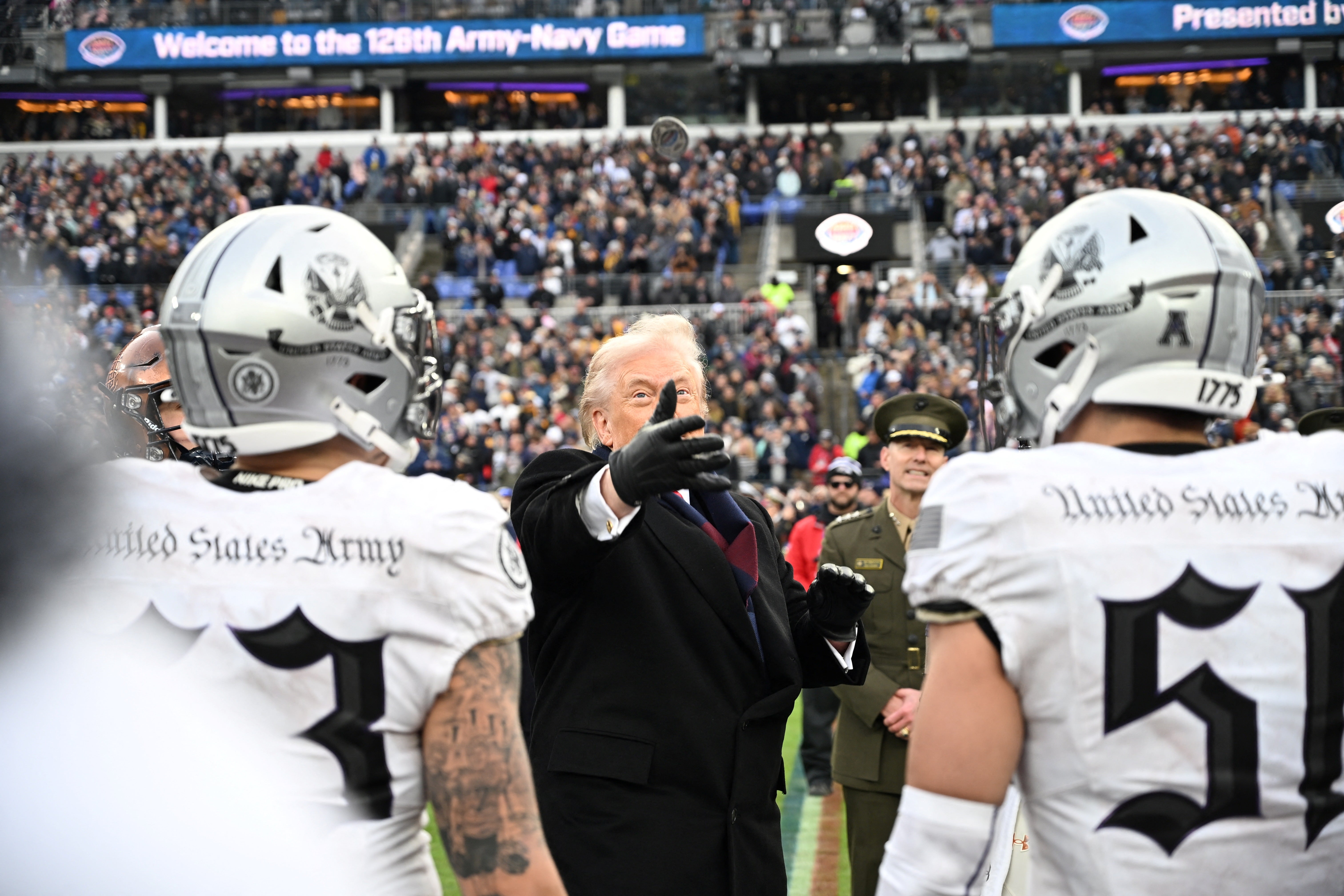President Donald Trump stunned sports fans with a "hilarious" coin toss at the Army-Navy football game on Saturday.