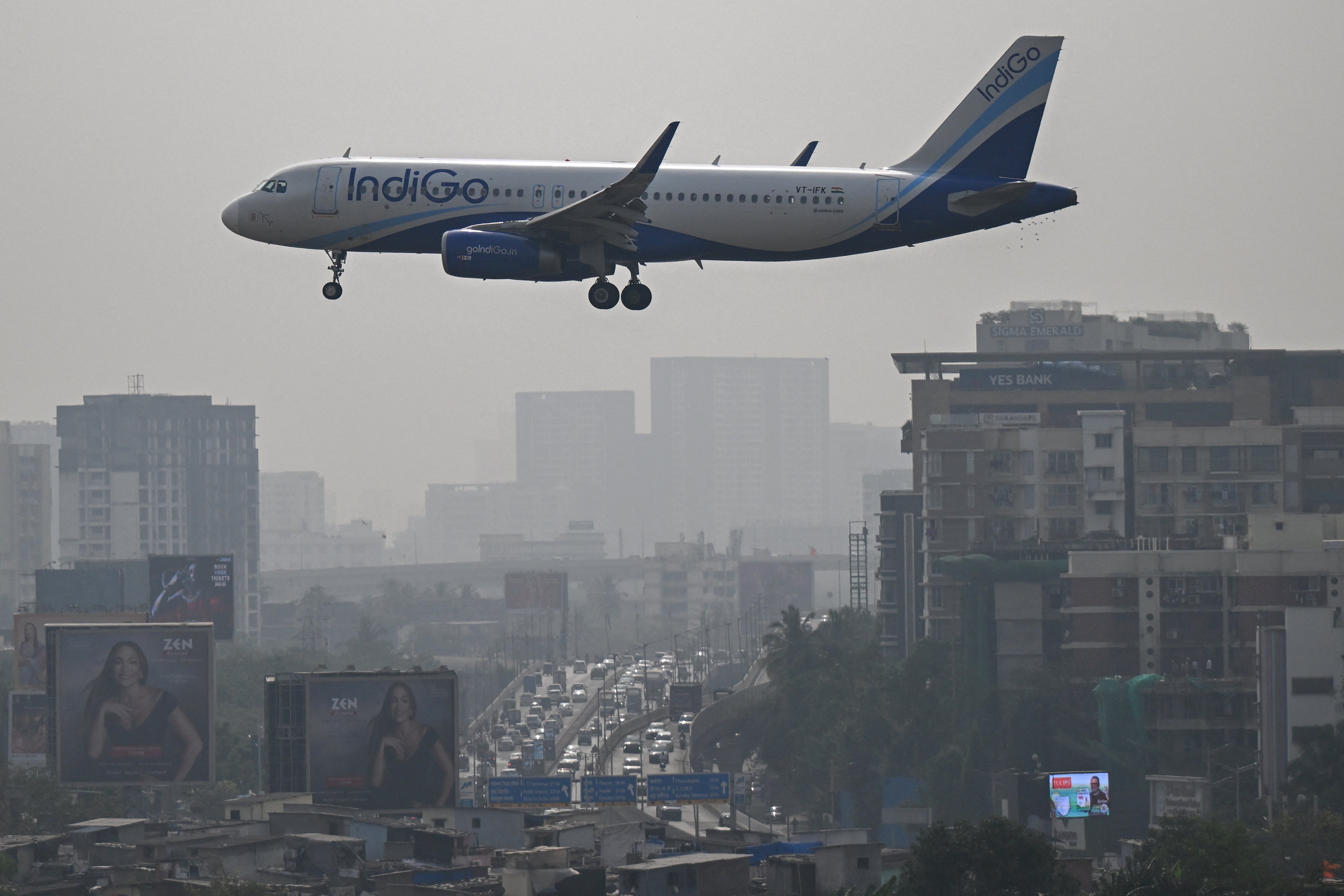 An IndiGo Airways aircraft prepares to land at the Mumbai airport