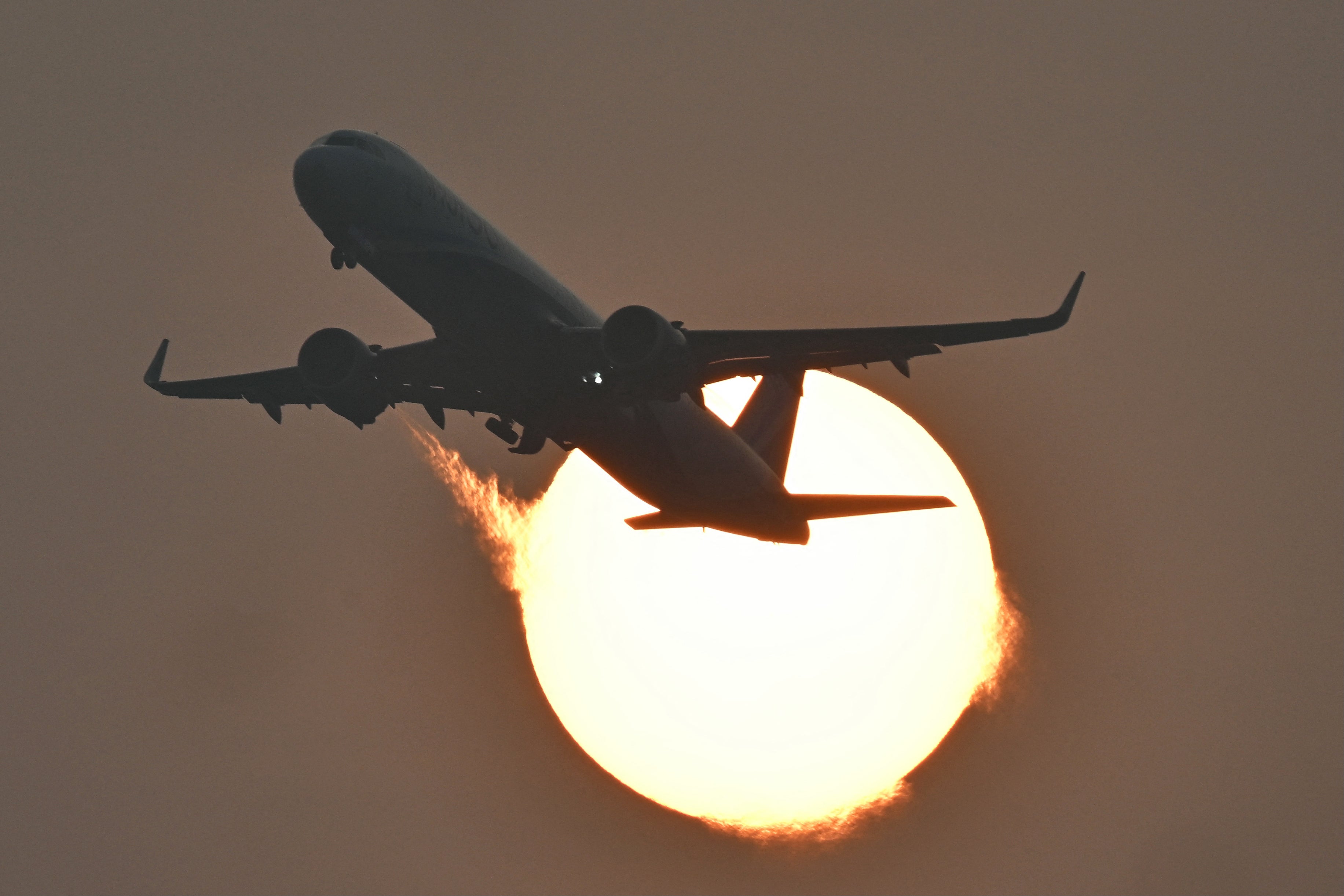<p>An aircraft of the Indian airline IndiGo takes off during sunset at the Kempegowda International Airport in Bengaluru</p>