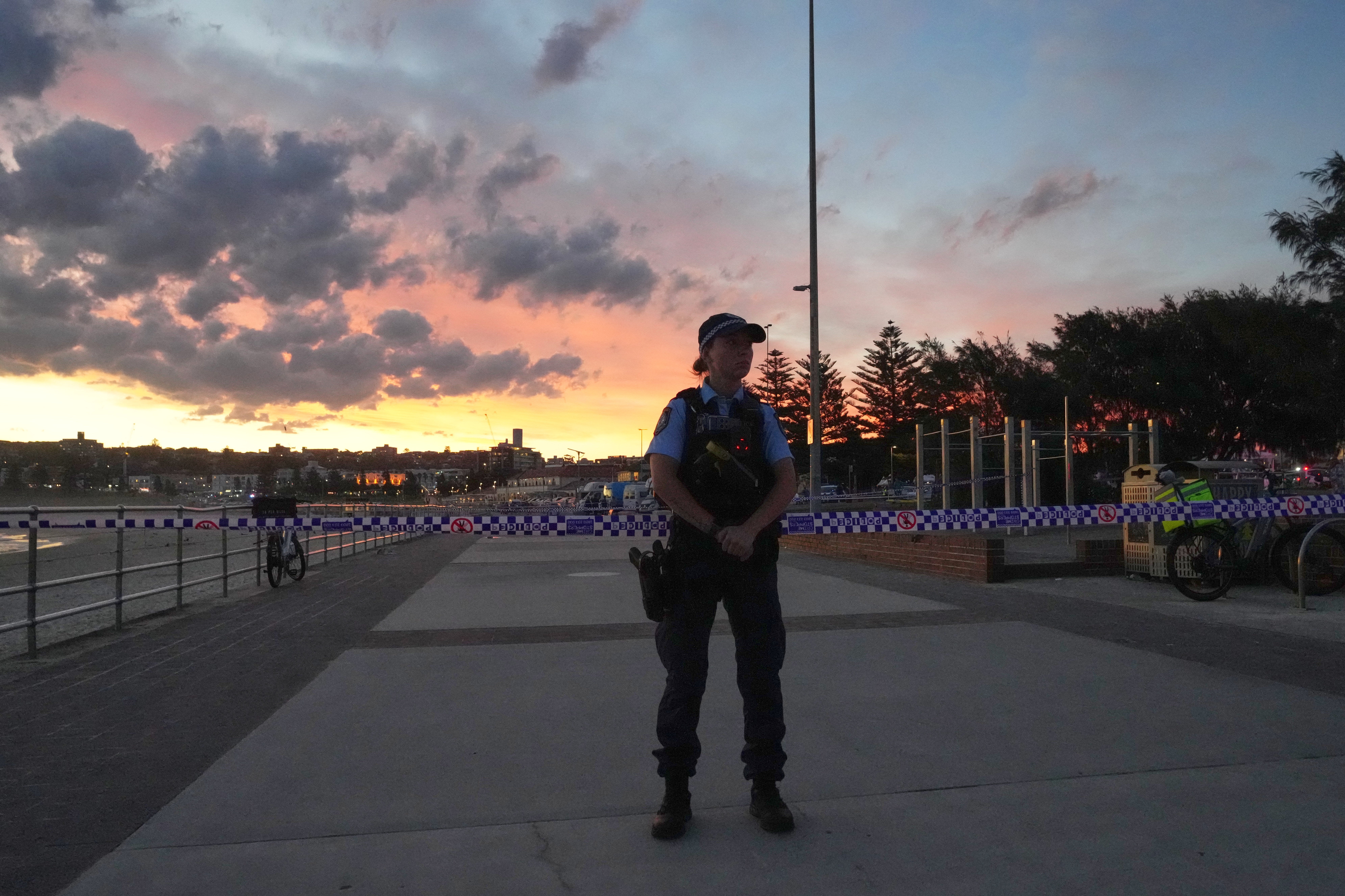 <p>Police cordon off an area after the Bondi beach shooting</p>