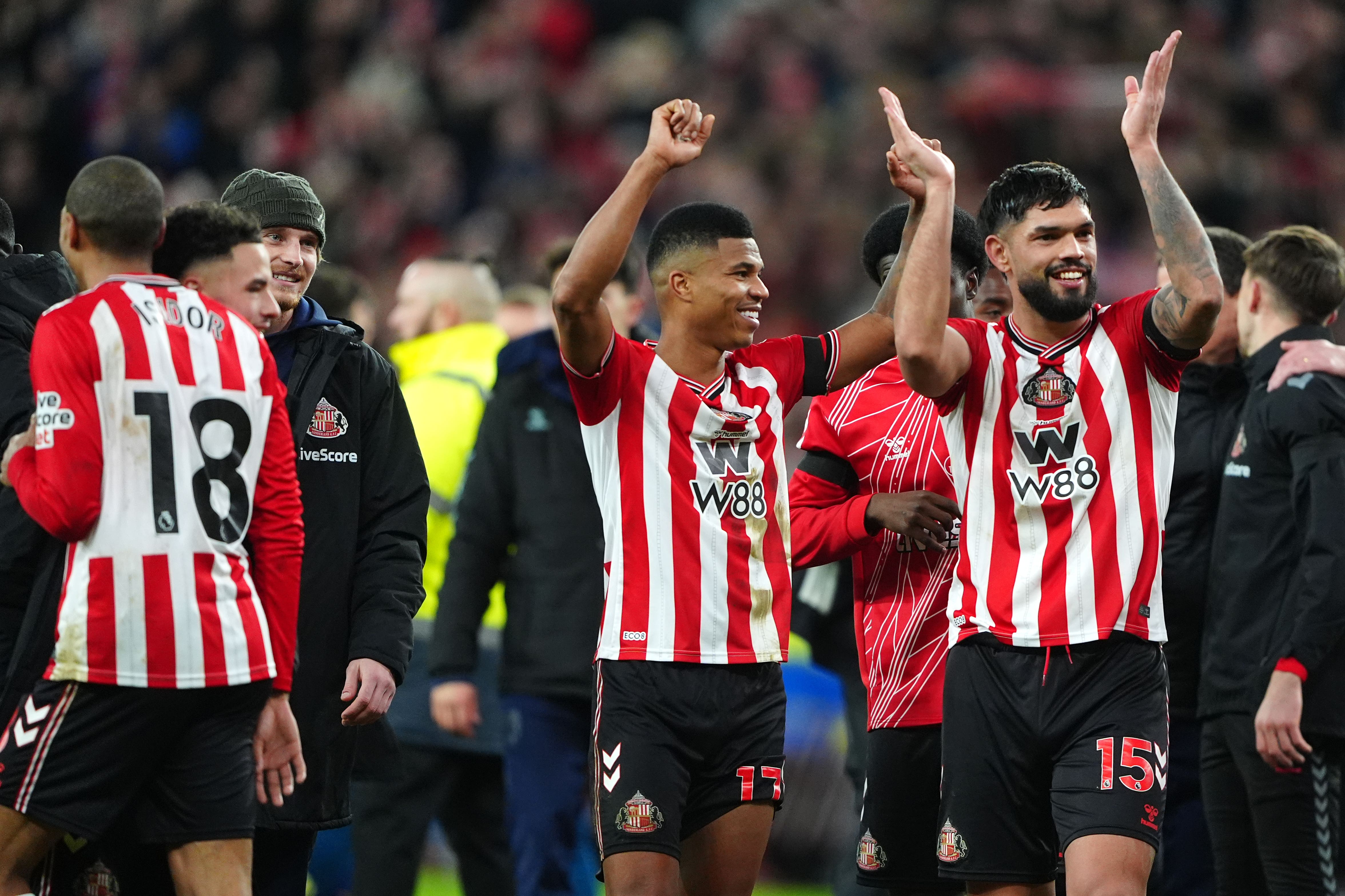 Sunderland players celebrate their win over Newcastle (Owen Humphreys/PA).