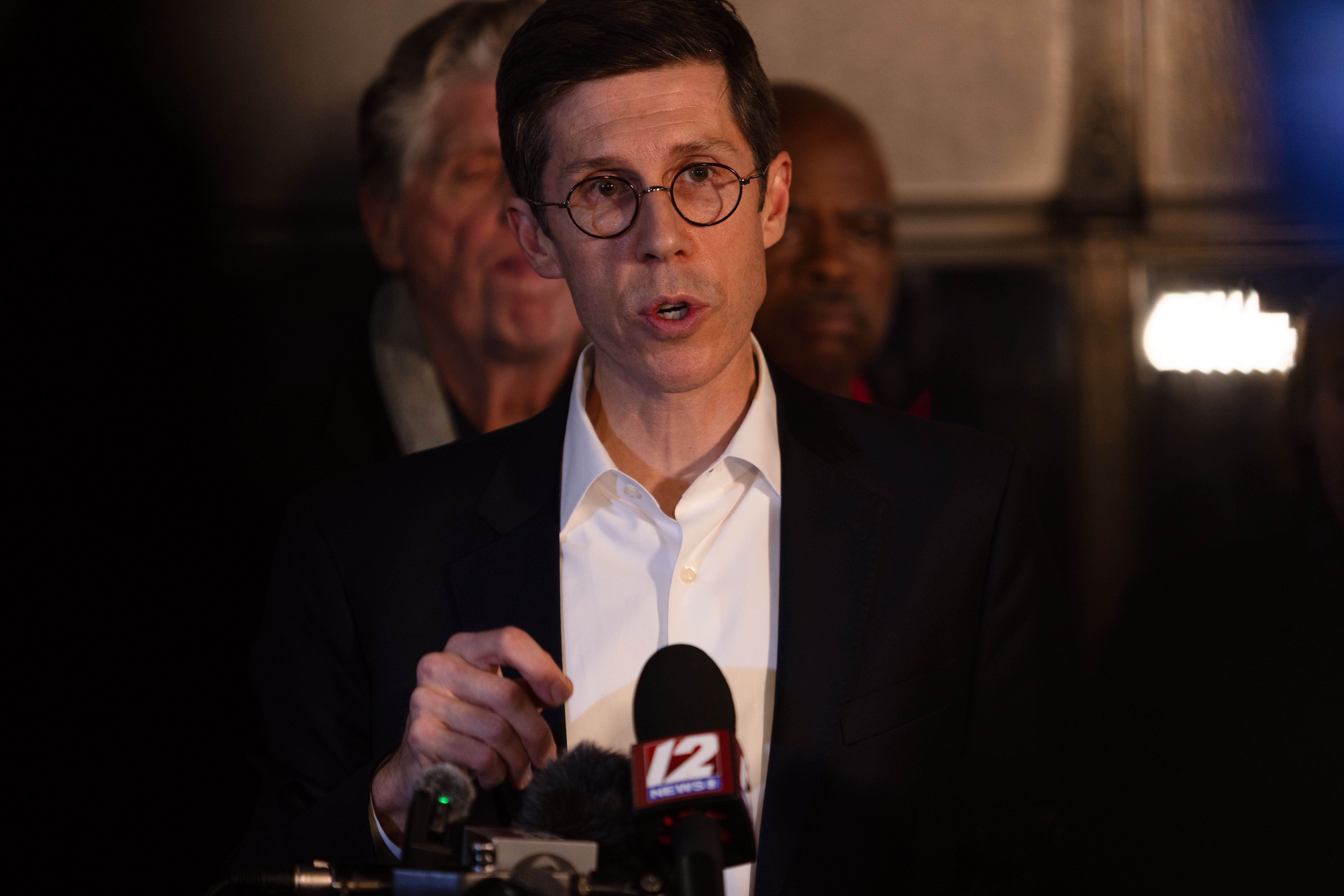 Providence Mayor Brett Smiley and other officials faced a barrage of questions asking how there could be so little information about the suspect hours after the attack