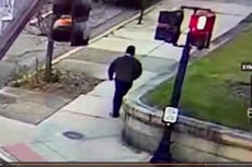 Police release footage of suspect in Brown University shooting as manhunt continues