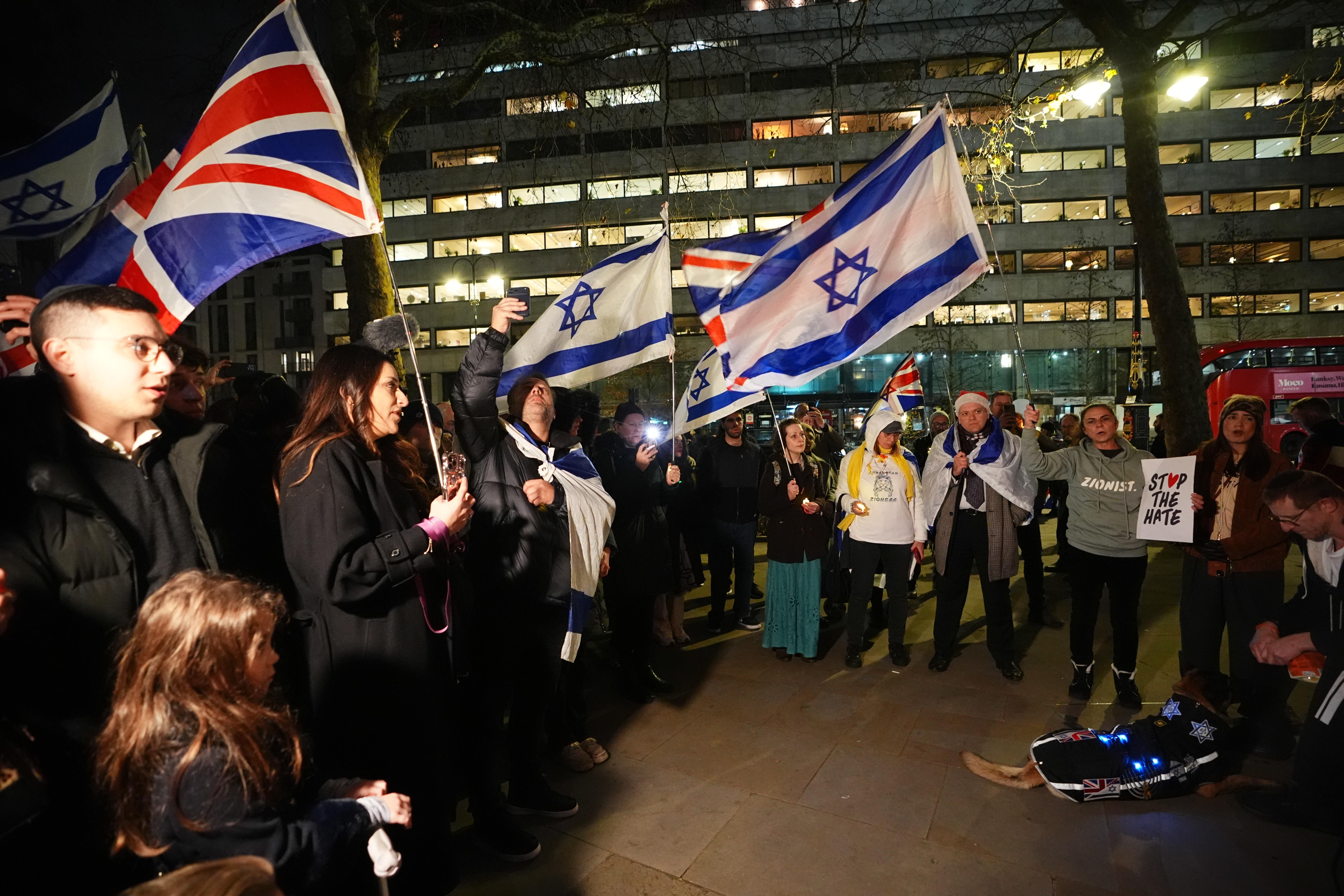People during a vigil outside the Australian High Commission in central London, following the terrorist attack targeting a Jewish celebration at Bondi Beach in Sydney, Australia (James Manning/PA)
