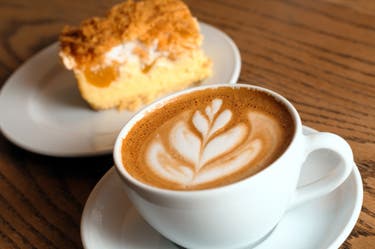 <p>A coffee and a slice of cake used to feel like a modest pleasure. Now it’s quietly become a measure of how expensive everyday life has become.</p>
